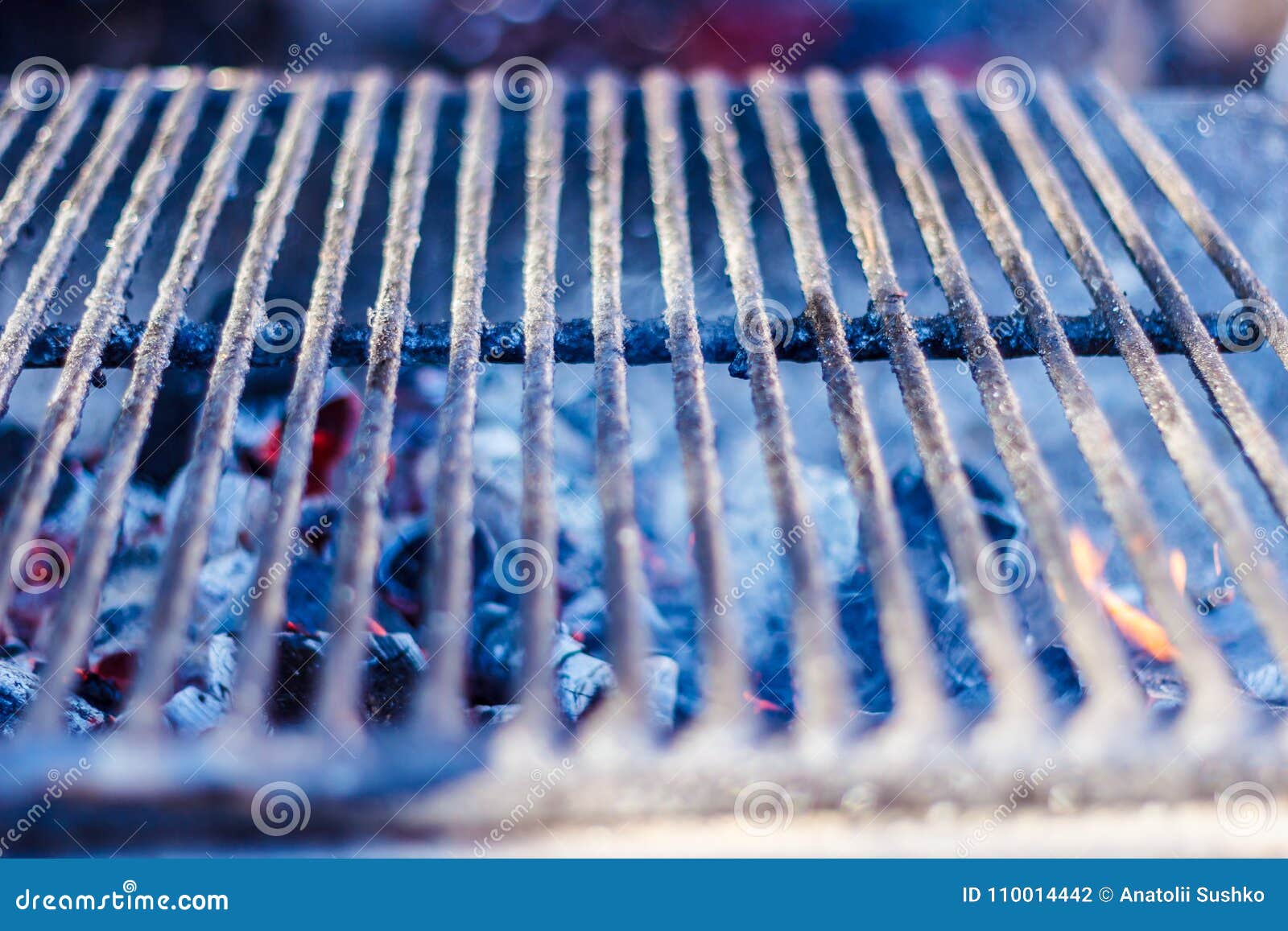 Metal Grill for Grilling on the Charcoal Grill in the Open Air. Stock
