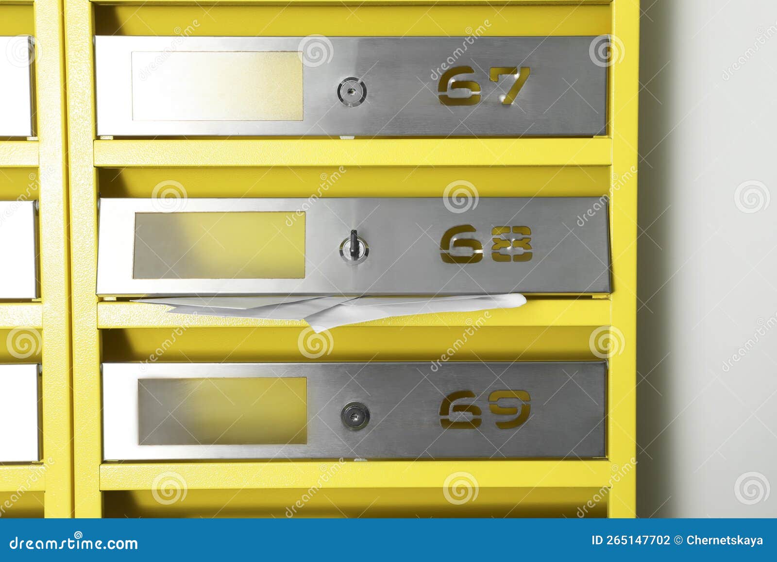 Metal Mailboxes with Keyholes, Numbers and Receipts in Post Office