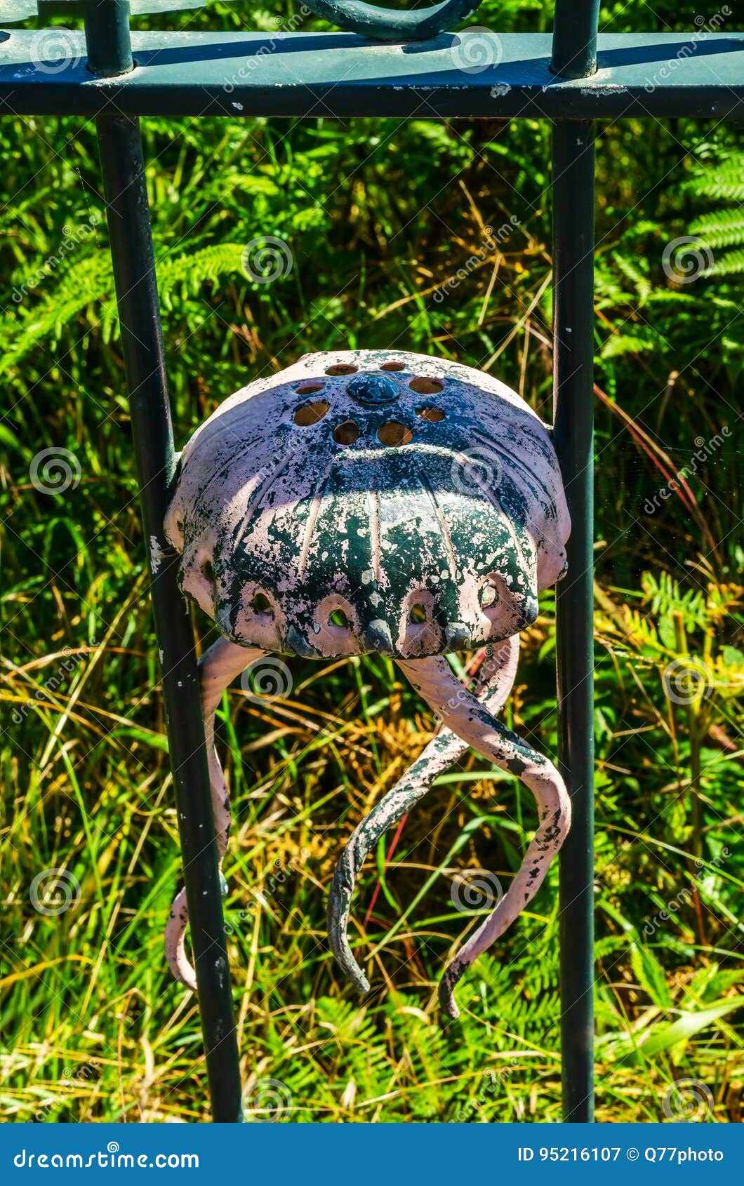 Metal Ornament on a Balustrade in a Seaside Village, Symbolic in Stock Metal Ornament on a Balustrade in a Seaside Village, Symbolic in Stock
