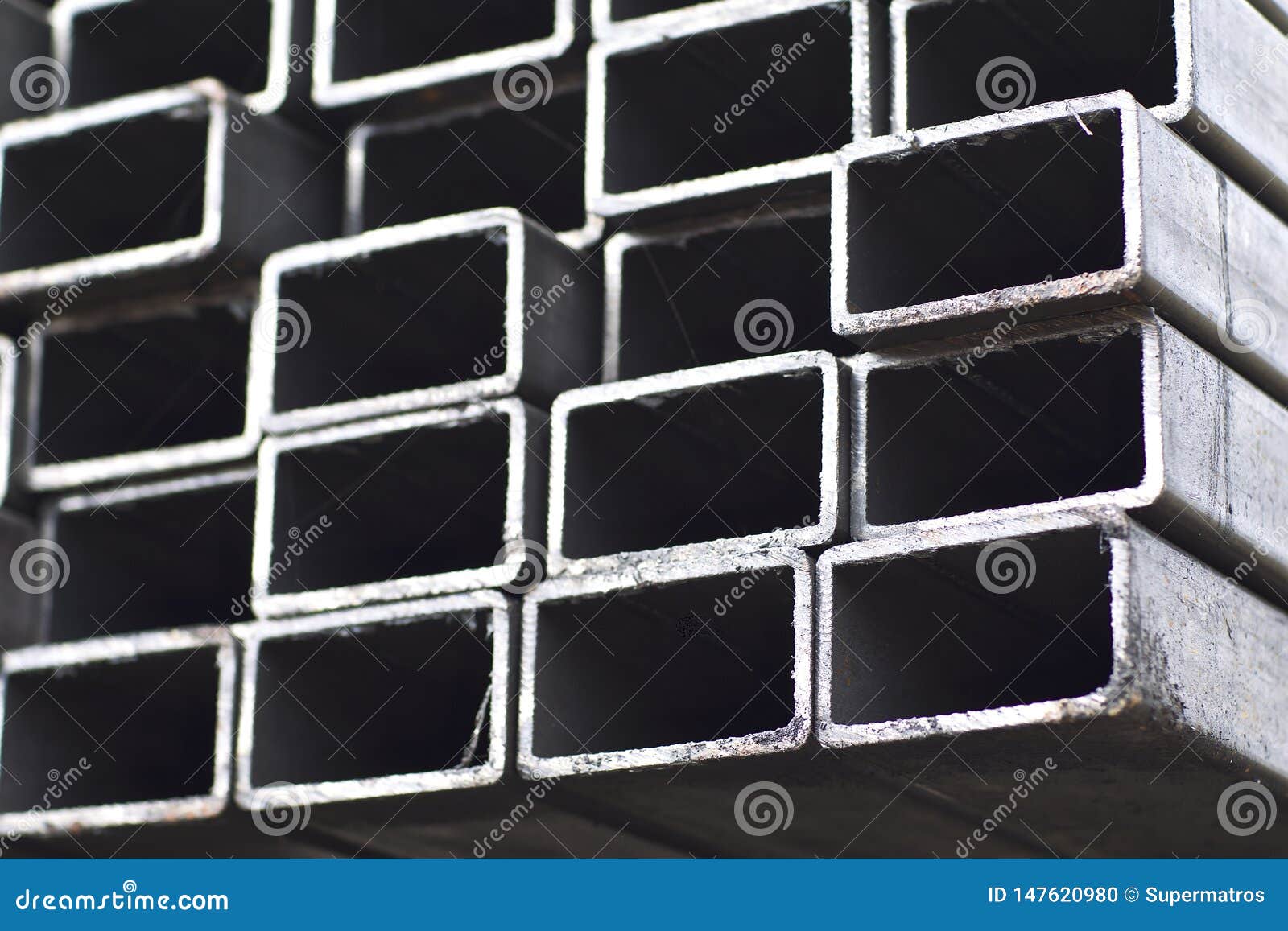 metal profile pipe of rectangular cross section in packs at the warehouse of metal products