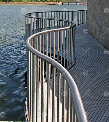 Metal railing by the water stock image. Image of handrail - 591741