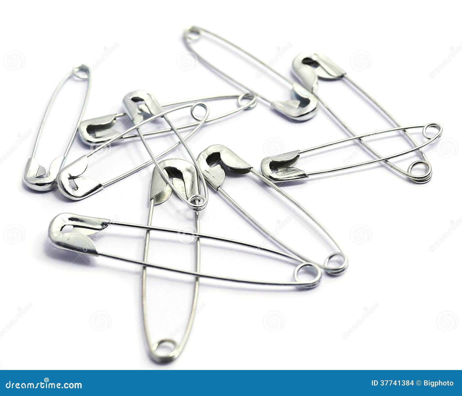 Metal Safety Pin on White Background. Stock Photo Image of background