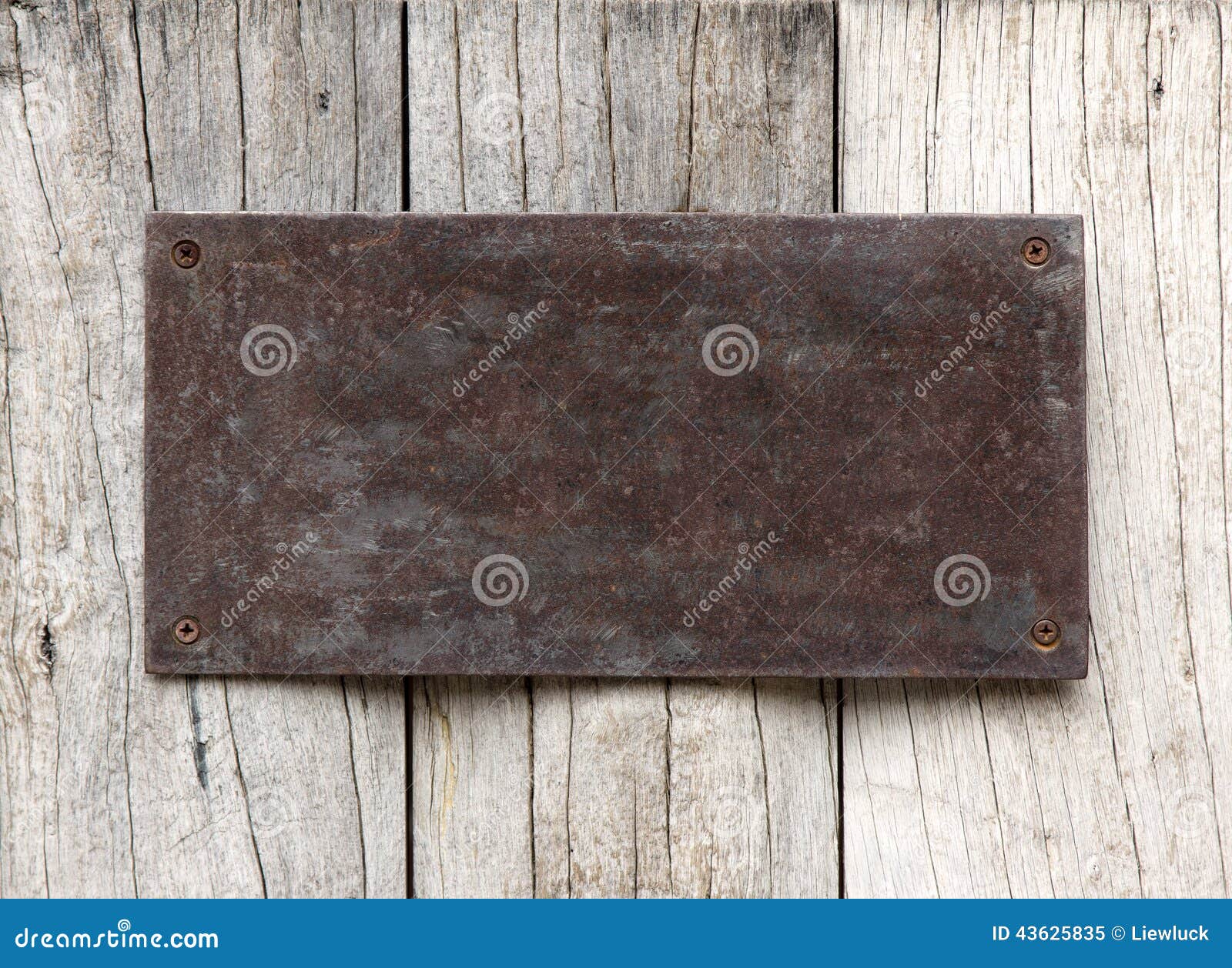 Metal sign on wood plank stock image. Image of plank 43625835
