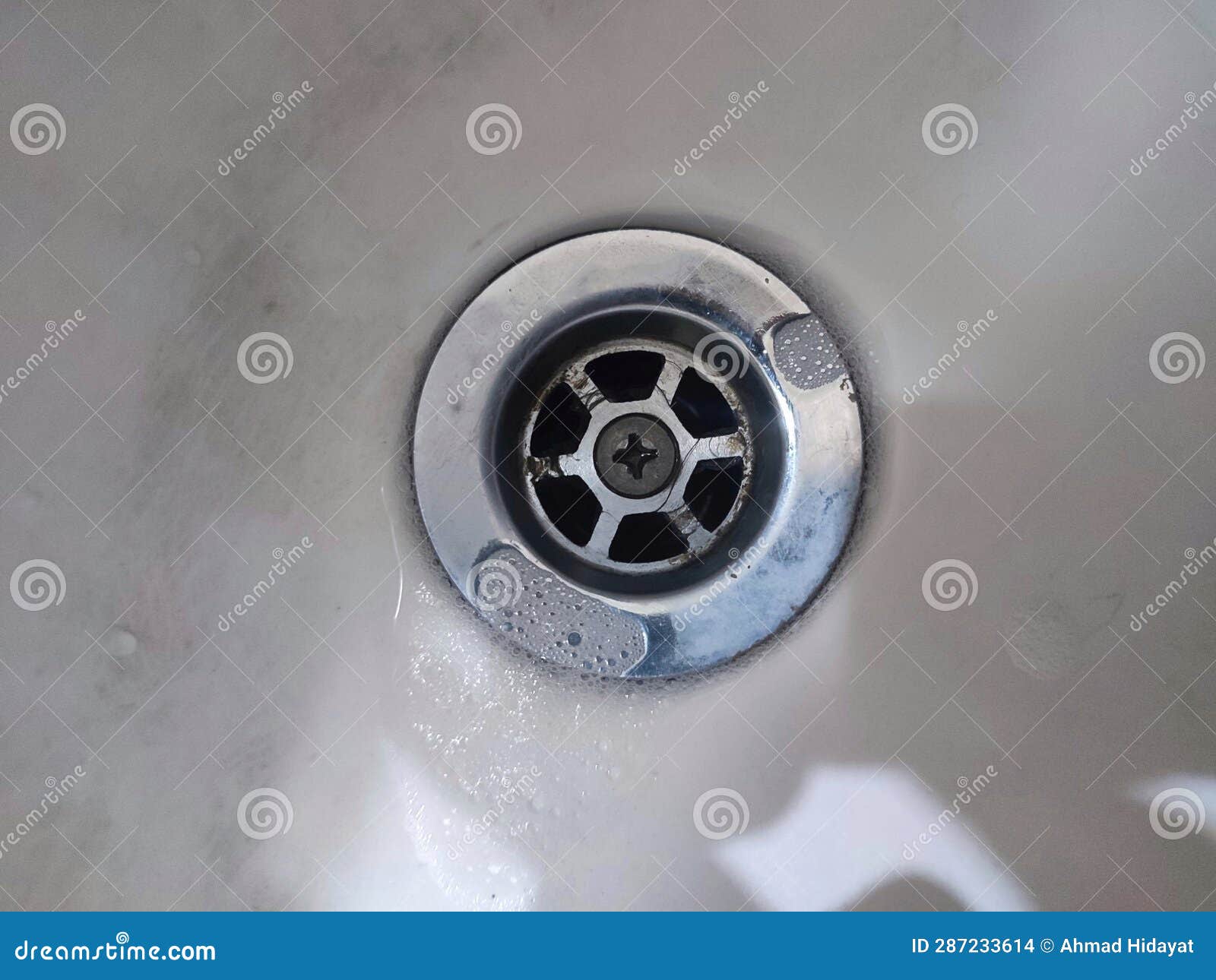 Metal Sink Drain on White. the Sink Hole in the Kitchen Stock Photo