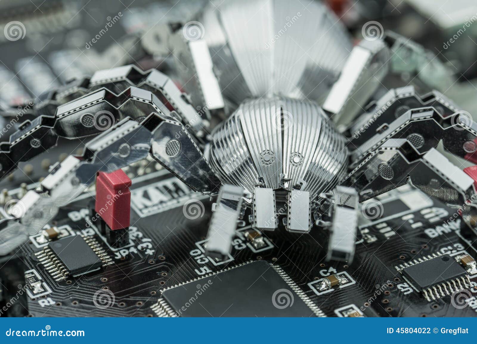A metal spider on a PCB stock photo. Image of design 45804022