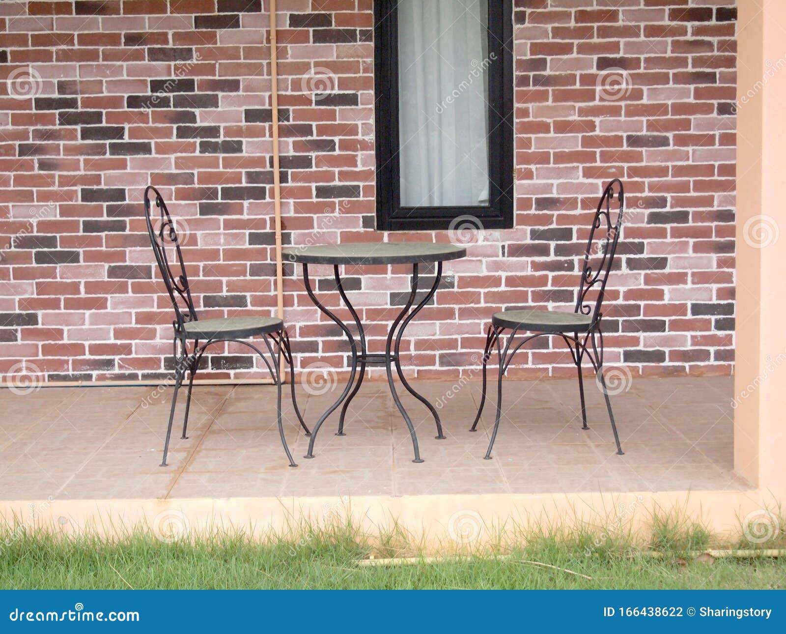 Metal table and chairs stock photo. Image of leisure 166438622