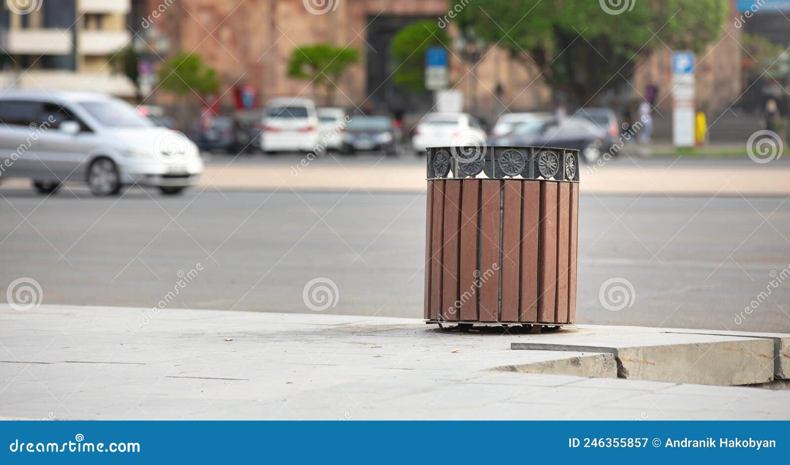 Metal trash bin in a city stock image. Image of garbage 246355857