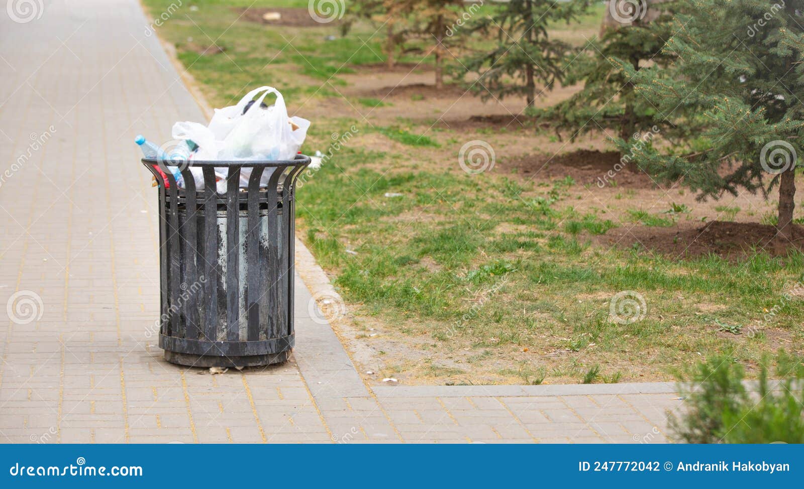 Metal trash bin in a city stock photo. Image of trash 247772042