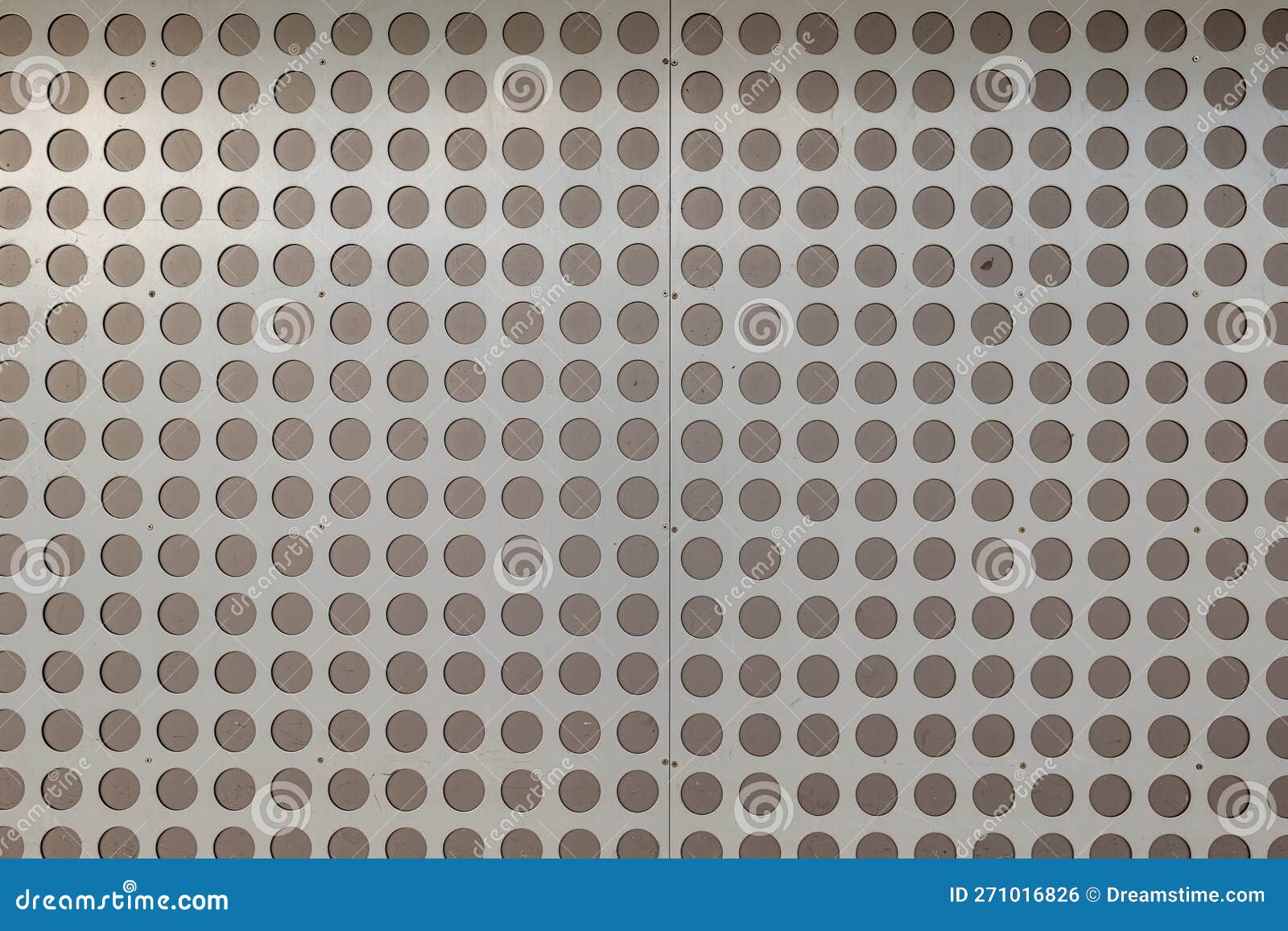 A metal wall with circles stock photo. Image of horizontal 271016826