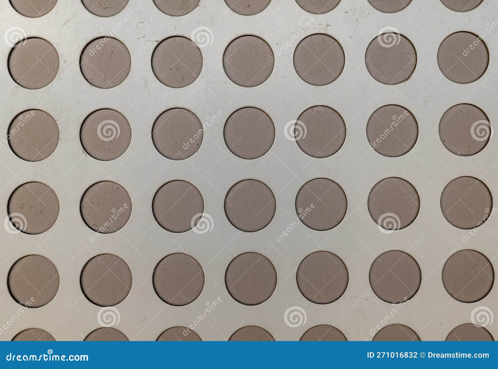 A metal wall with circles stock photo. Image of stylish 271016832