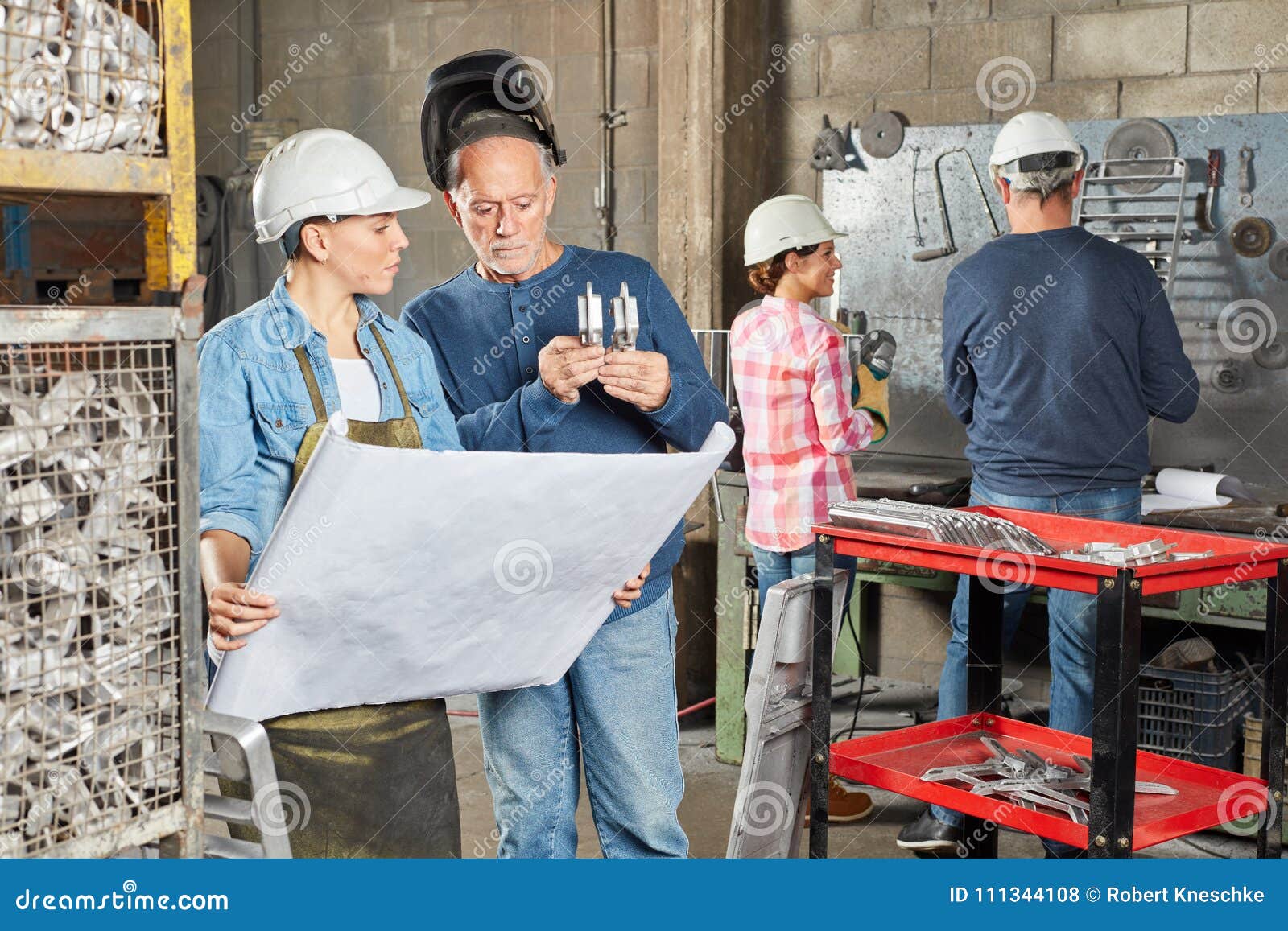 Metal Worker with Experience and Apprentice Stock Photo Image of
