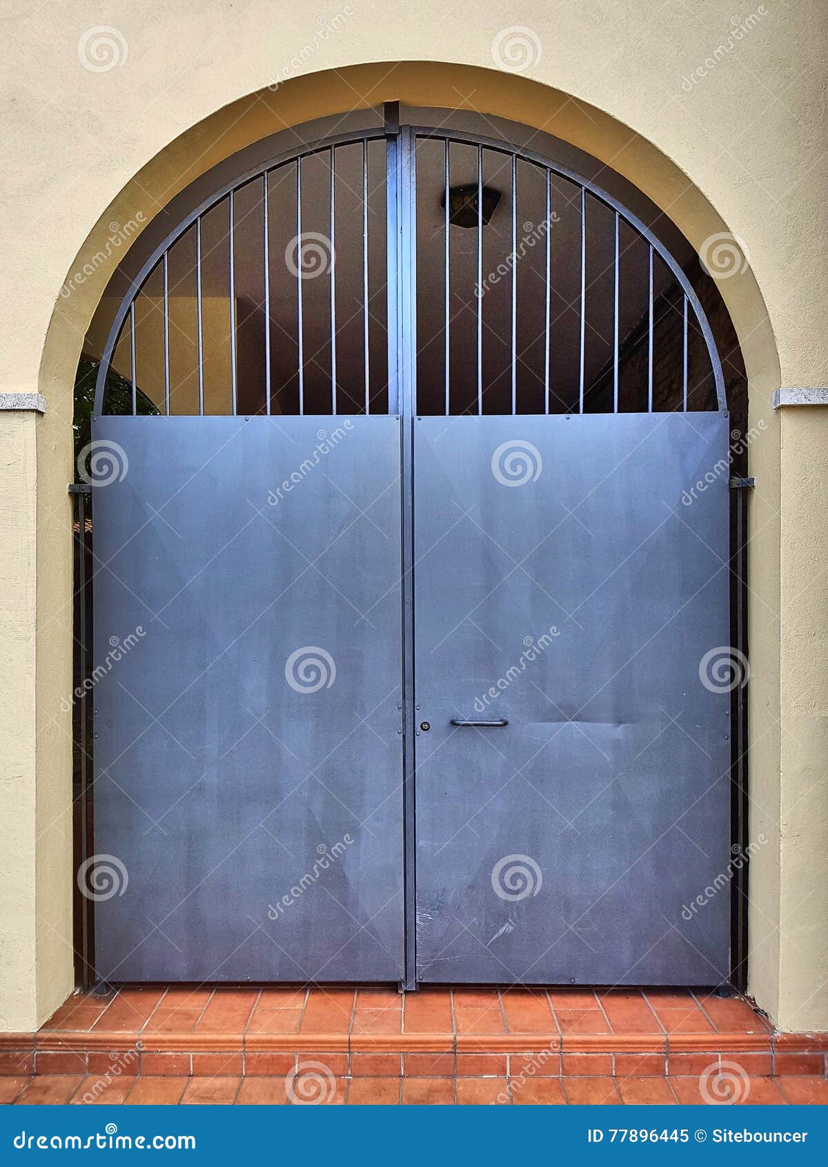 Metal Yard Door with Arch and Grating. Stock Image Image of double