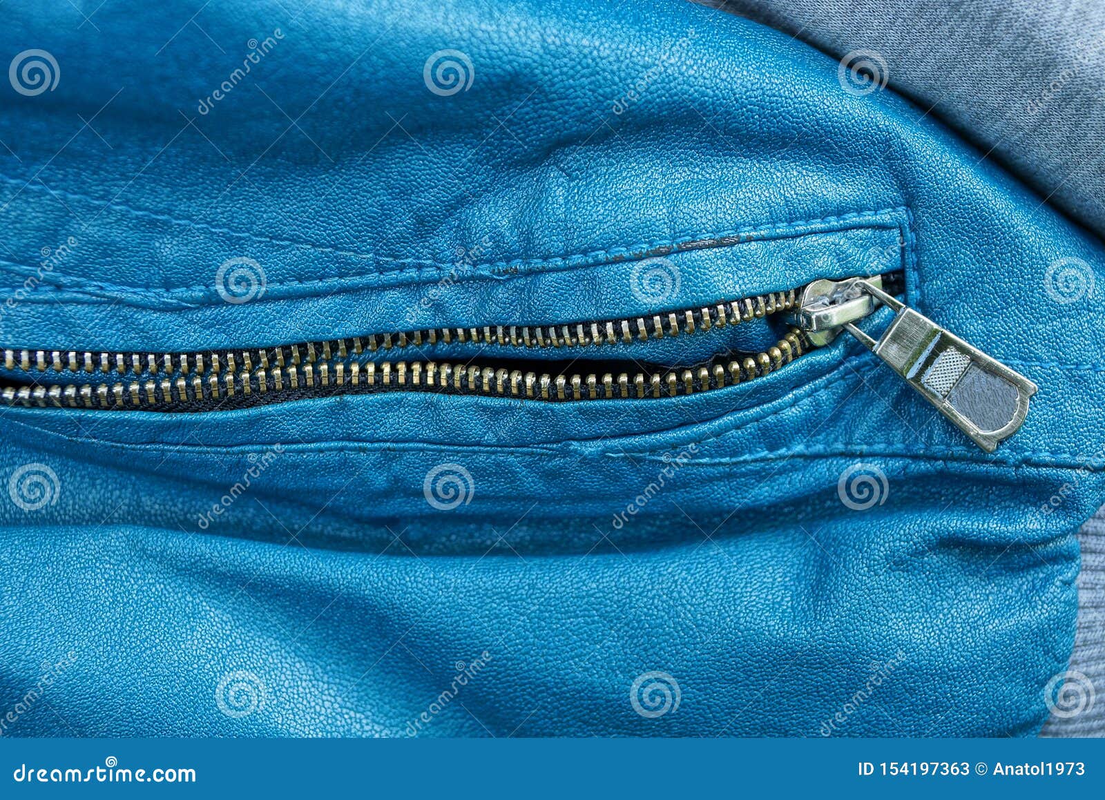 Metal Zip on Blue Skin on a Piece of Clothing Stock Image - Image of ...