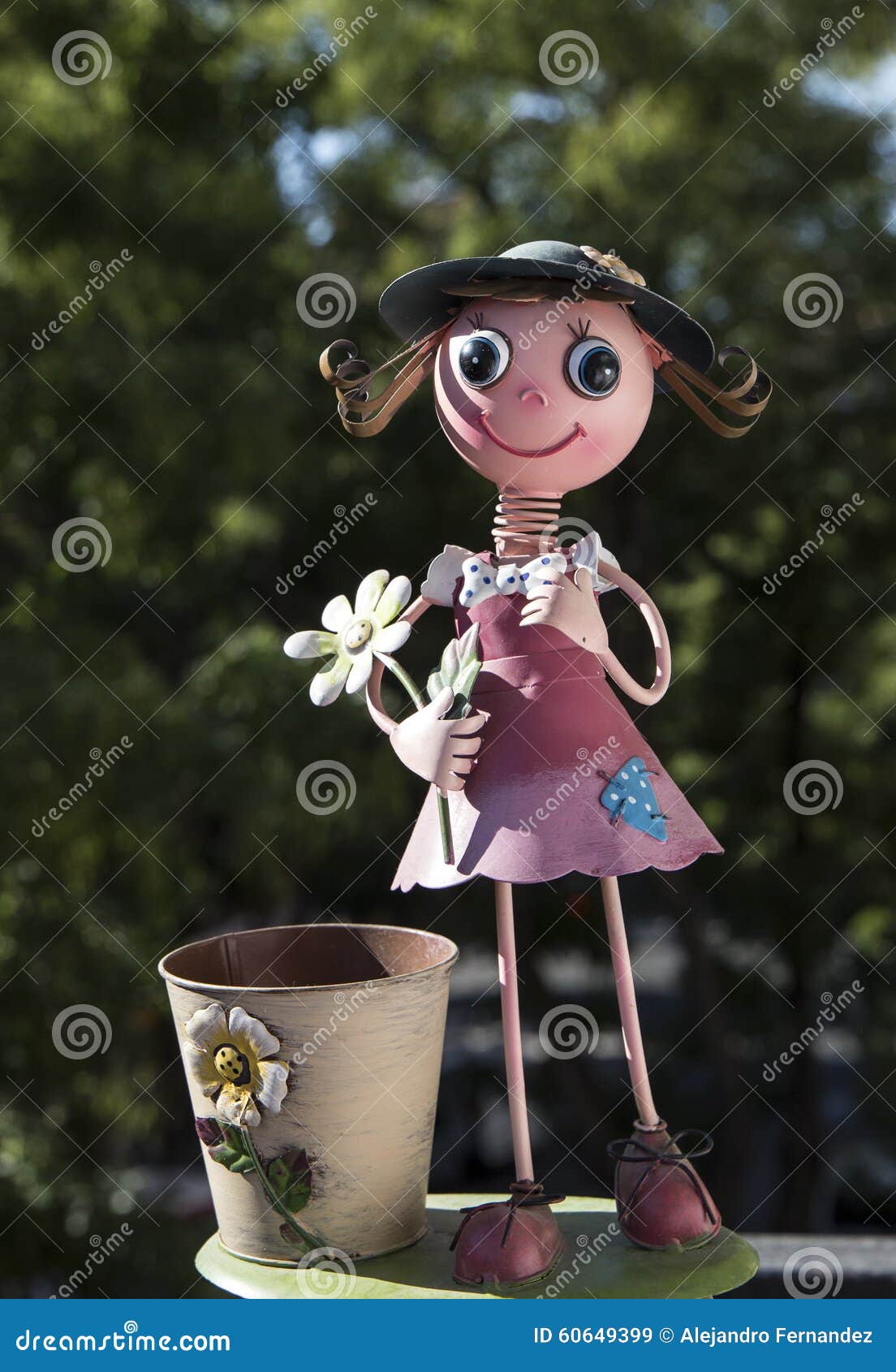 Metallic garden doll stock image. Image of tree, pink 60649399
