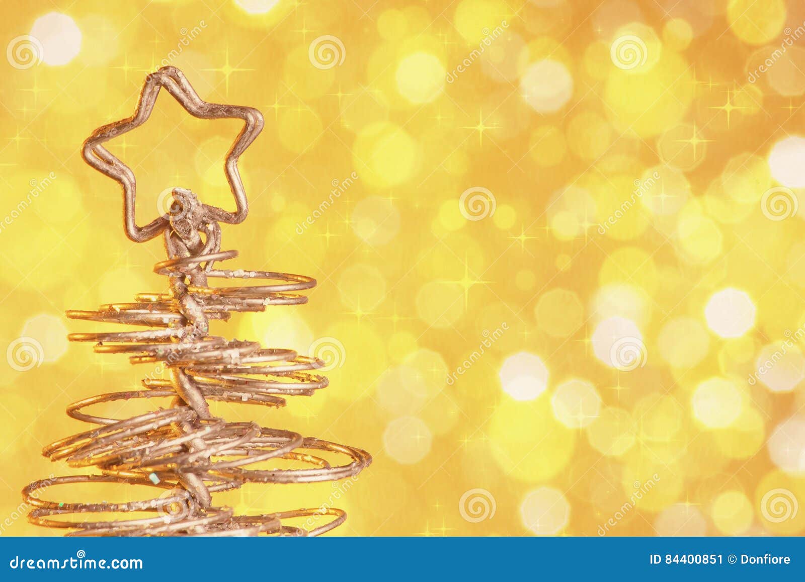 Metallic Modern Christmas Tree on Golden Tint Light Bokeh Background ...