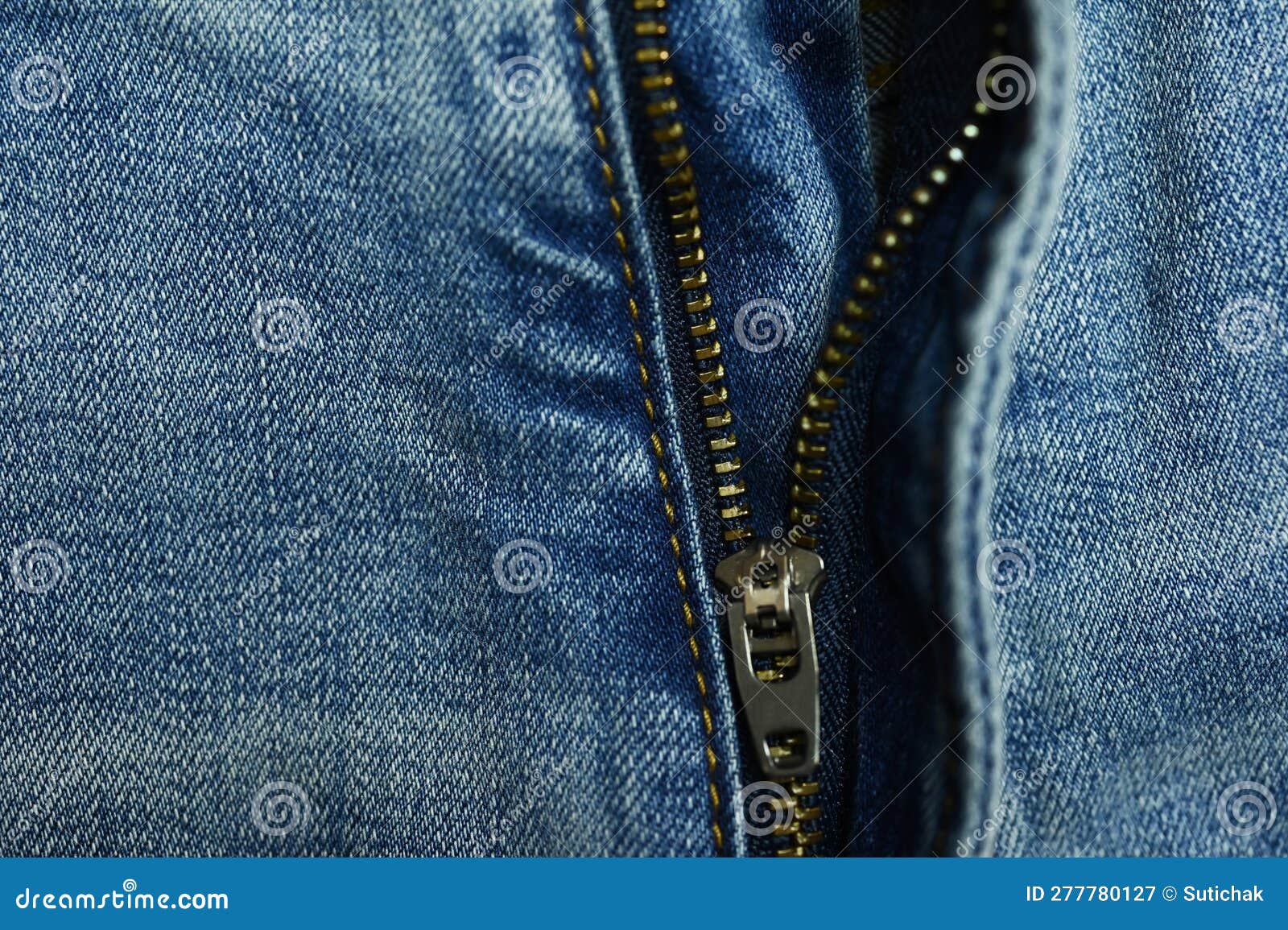 Metallic zip on blue jeans stock image. Image of fashion - 277780127