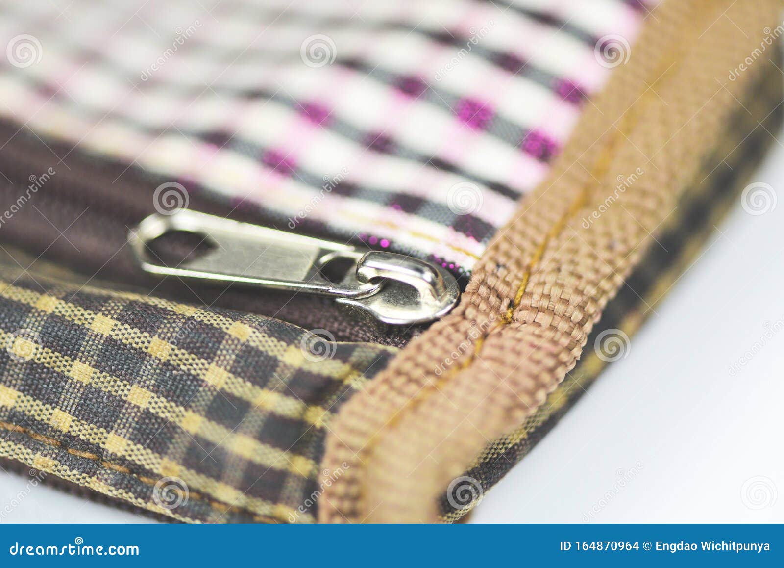 Metallic Zipper for Clothes Close Up Open Zip on Handbag Stock Photo