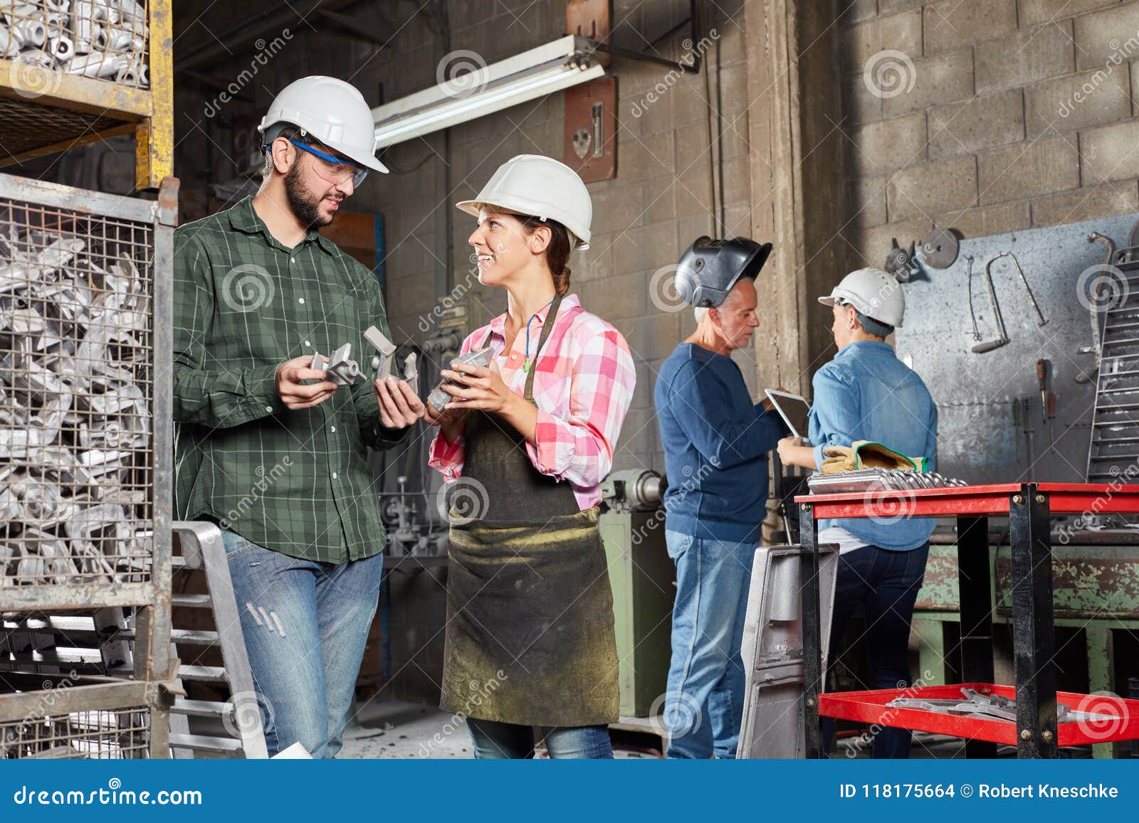 Metalworking with Apprentice Stock Photo Image of foundry