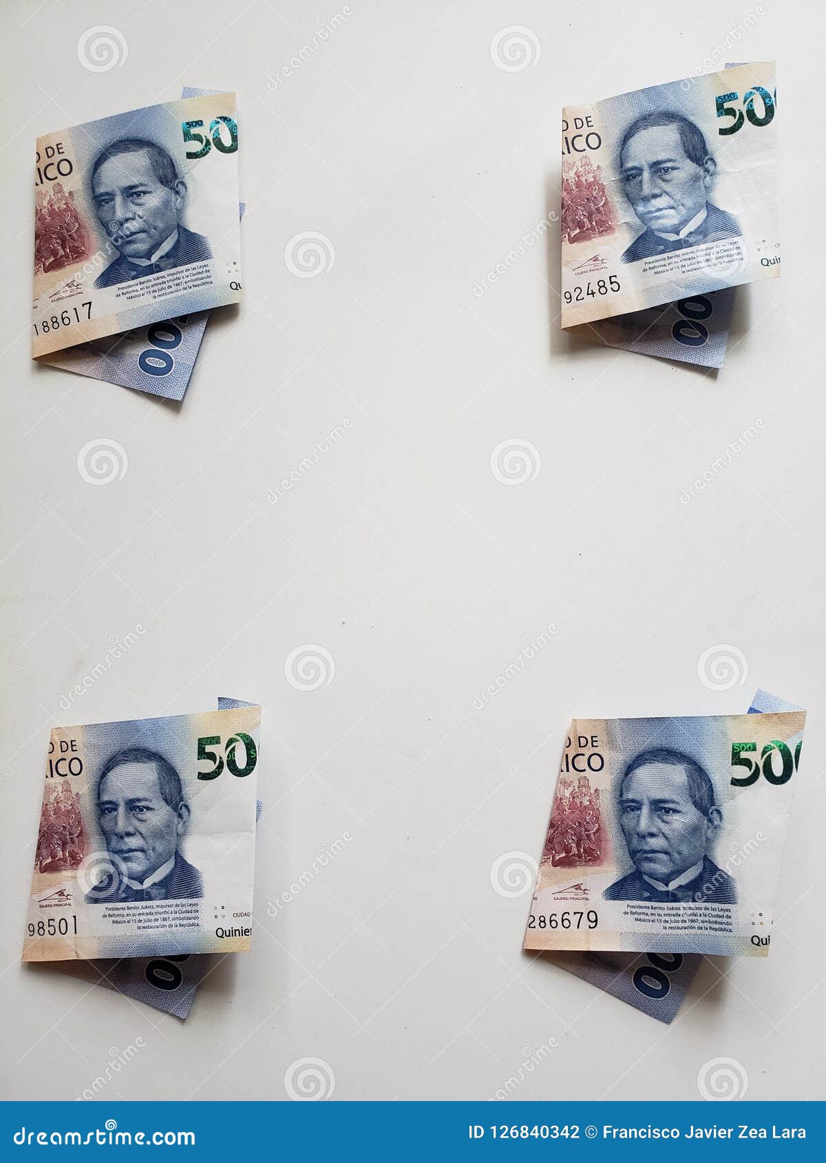 mexican banknotes of 500 pesos in corners and white background
