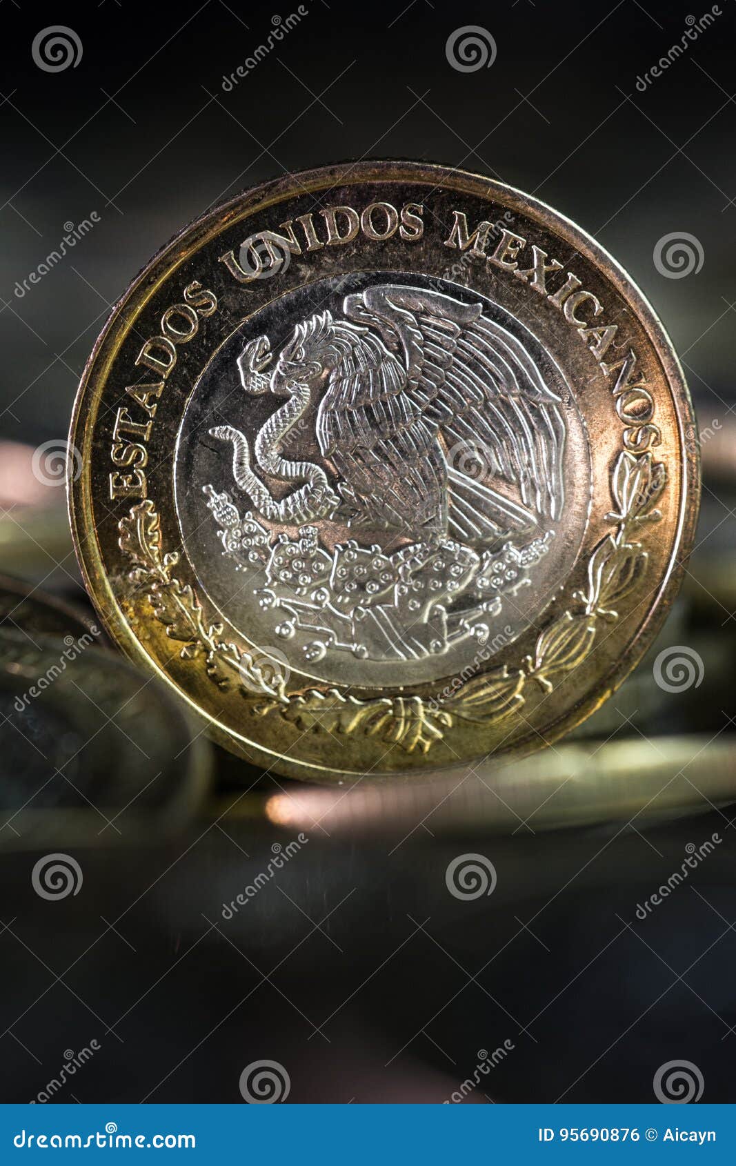 mexican currency in the foreground,with dark background