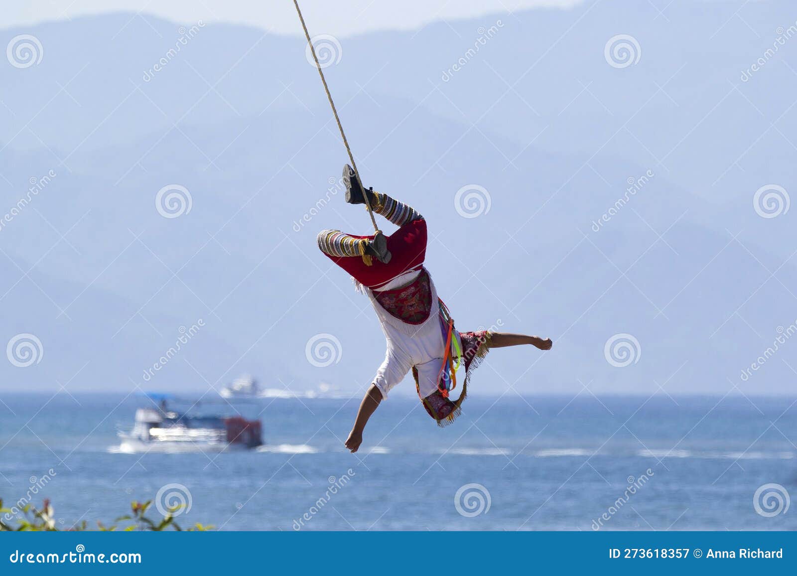 volador is flying on the rope in ancient ritual dance in mexico