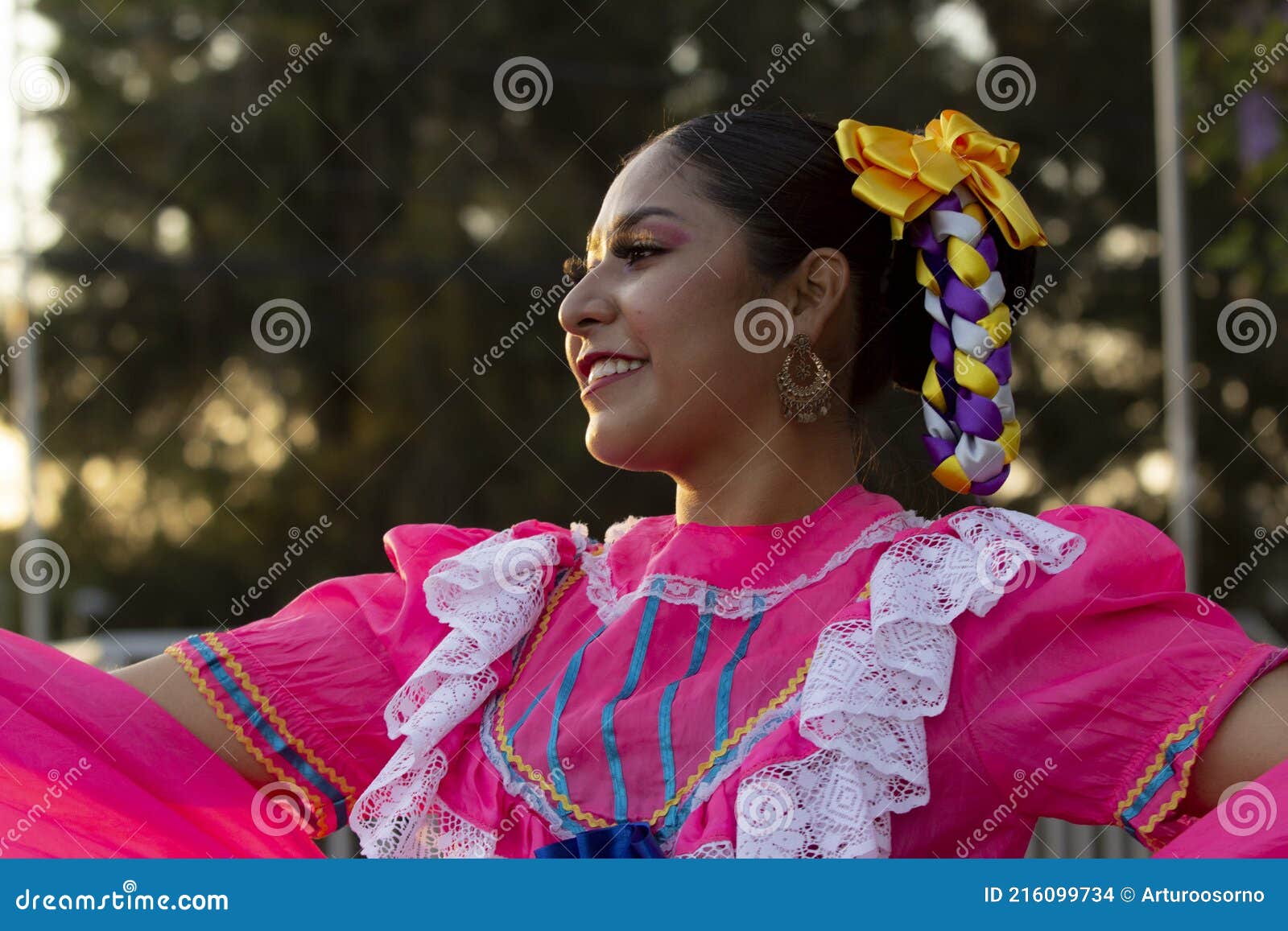 mexican folkloric dancer with traditional costume