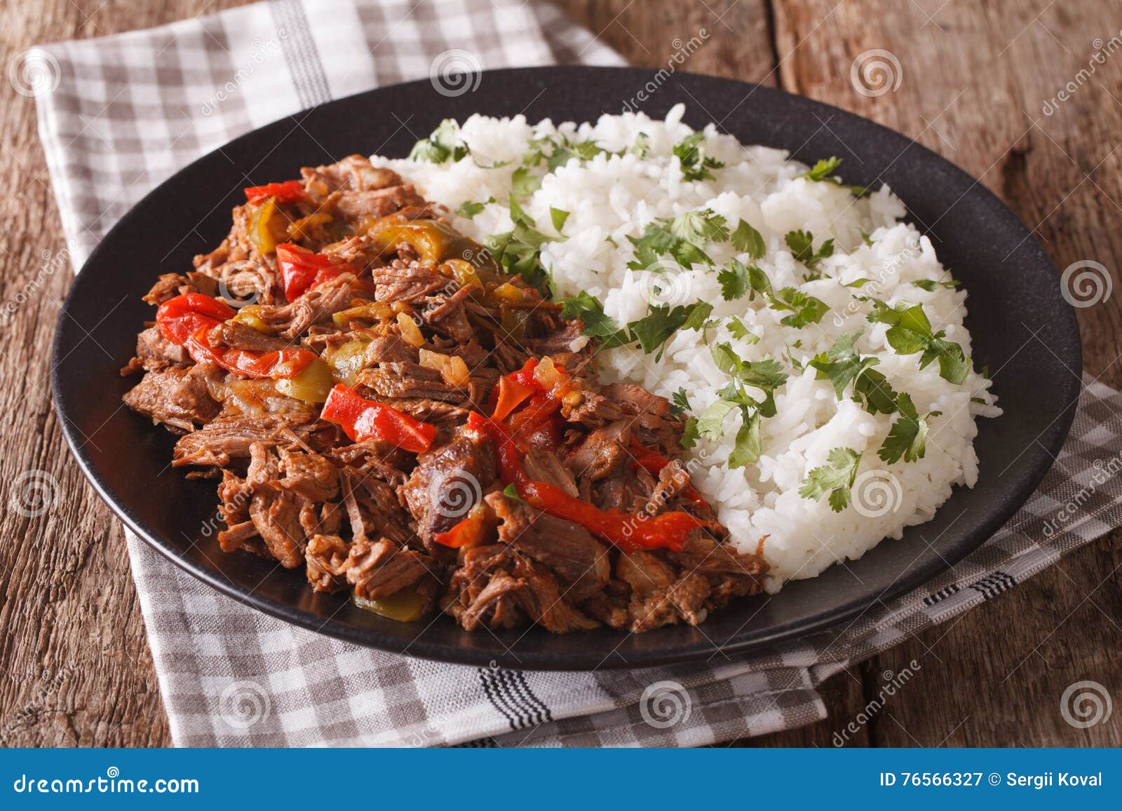 mexican food ropa vieja: beef stew in tomato sauce with vegetabl