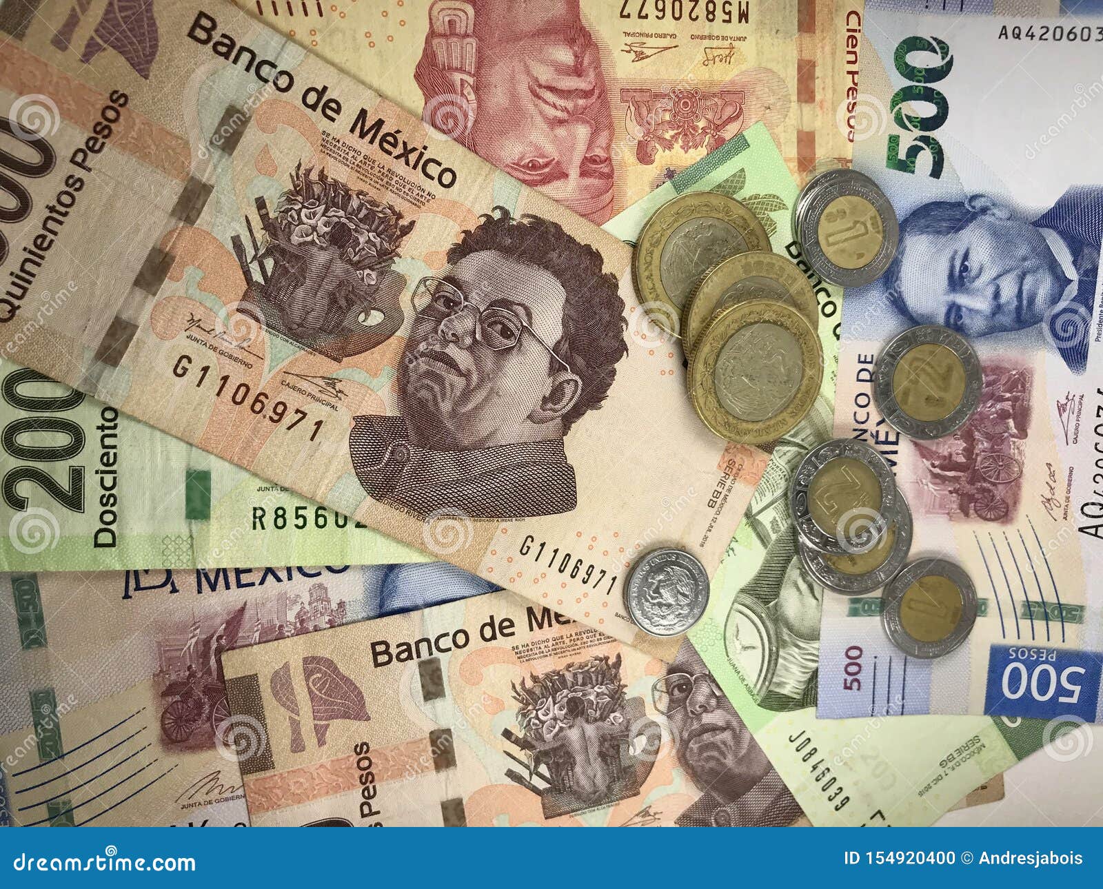 Mexican Peso Bills Spread Randomly Over a Flat Surface Stock