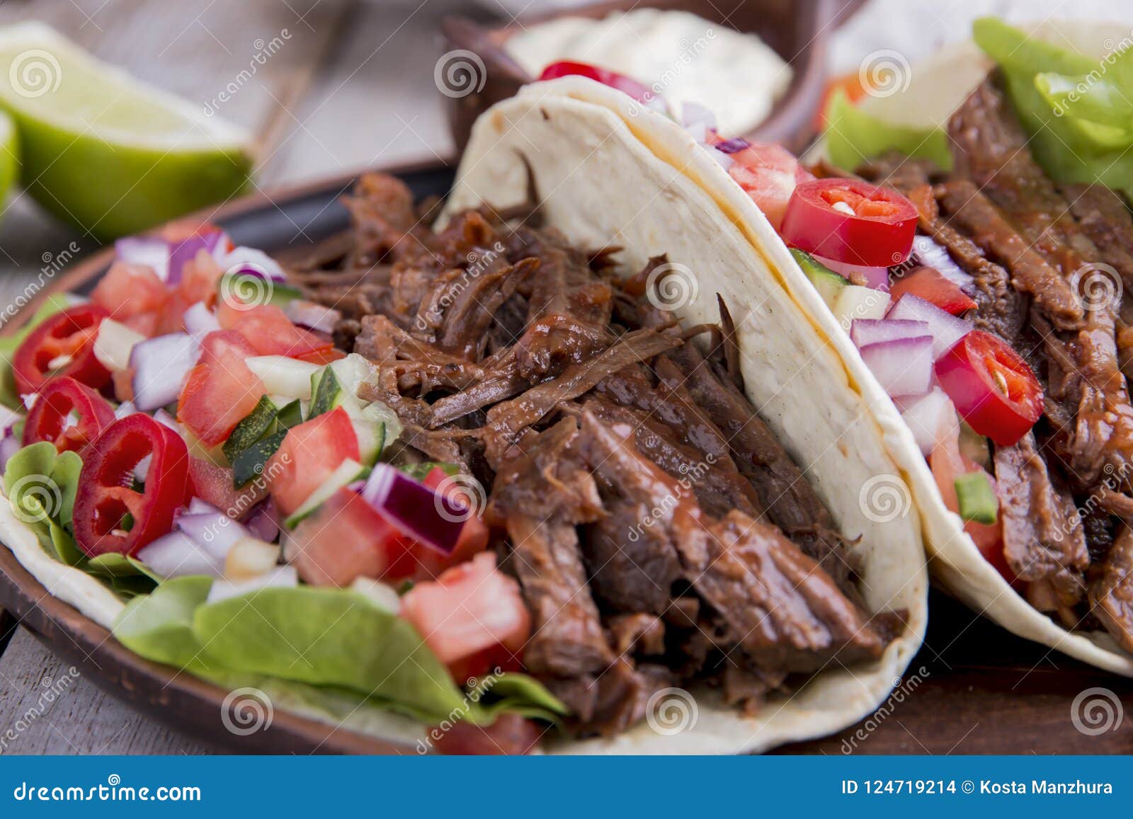 Mexican Tacos with Roasted Beef ,sauce and Salsa Tomato Stock Photo