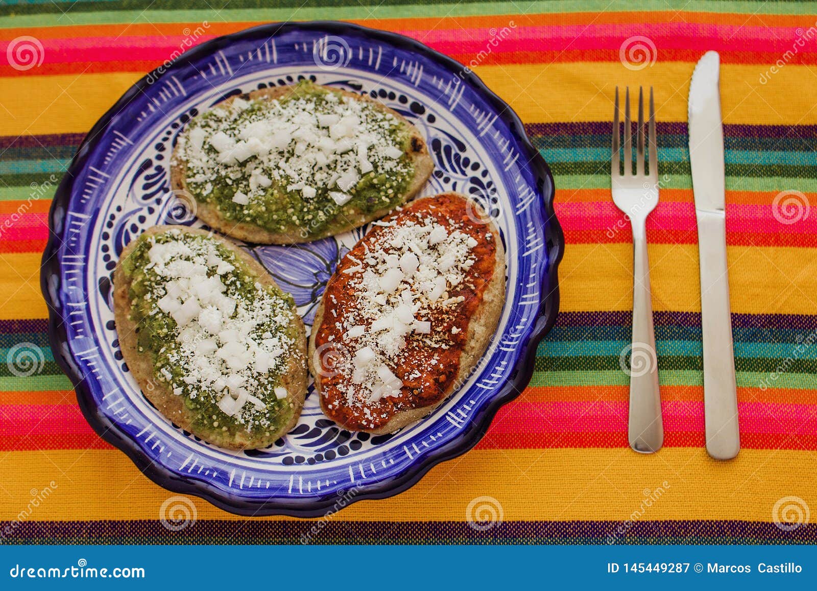 mexican tlacoyos with green and red sauce, traditional food in mexico