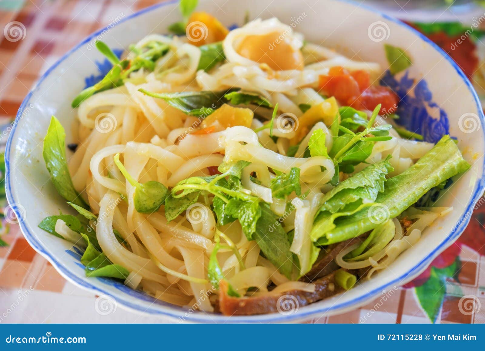mi quang noodle with meat, vegetable, fish, chicken and spices