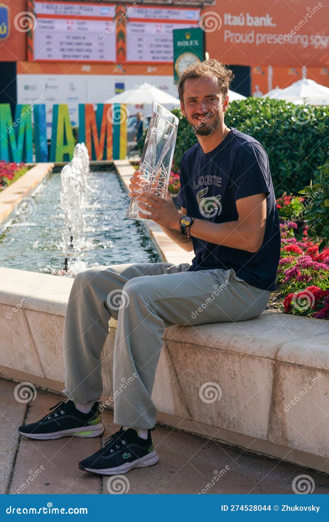 Daniil Medvedev of Russia, right, poses after winning the final