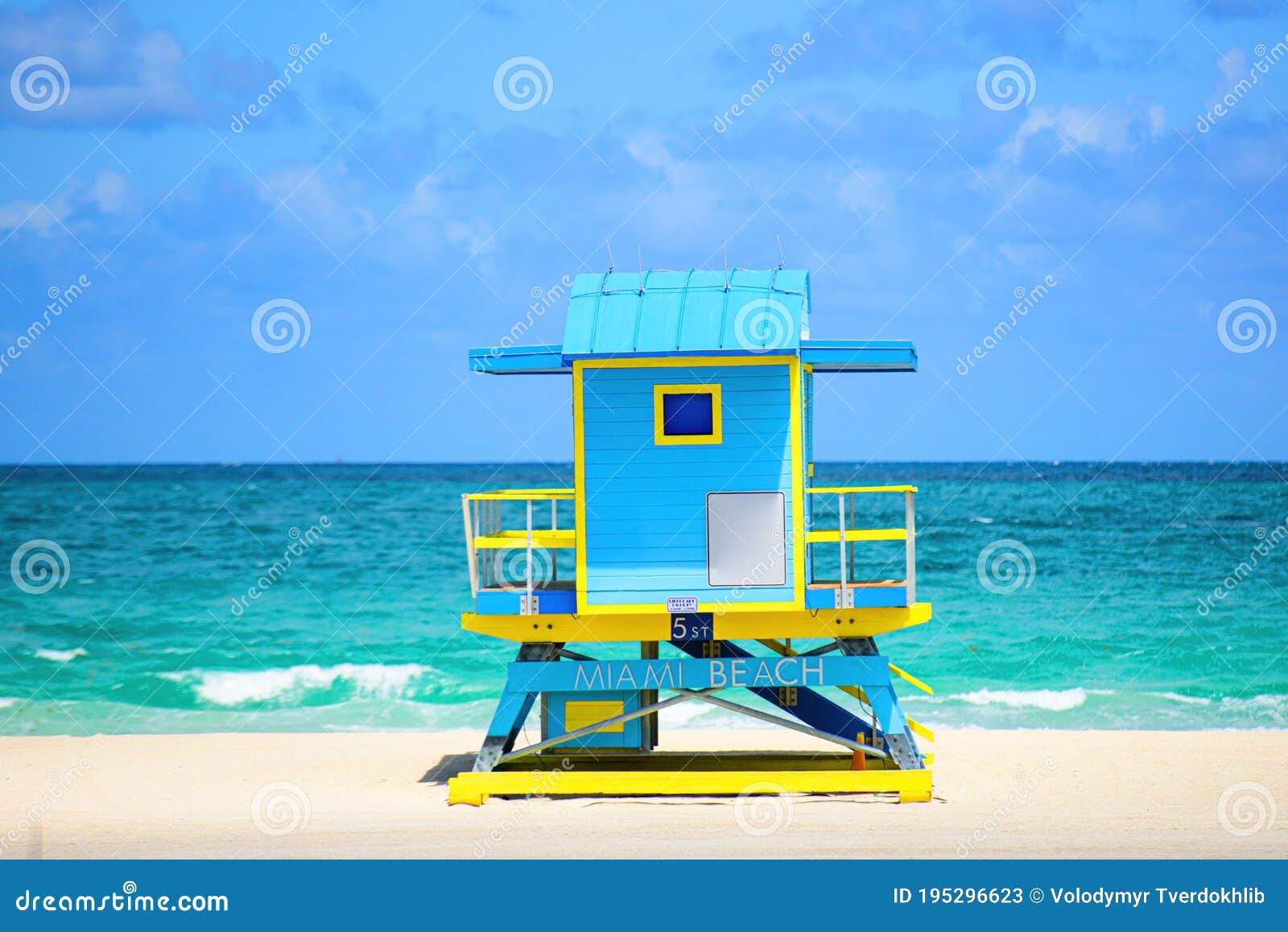 Miami South Beach skyline. Lifeguard tower in colorful Art Deco style and Atlantic Ocean at sunshine.