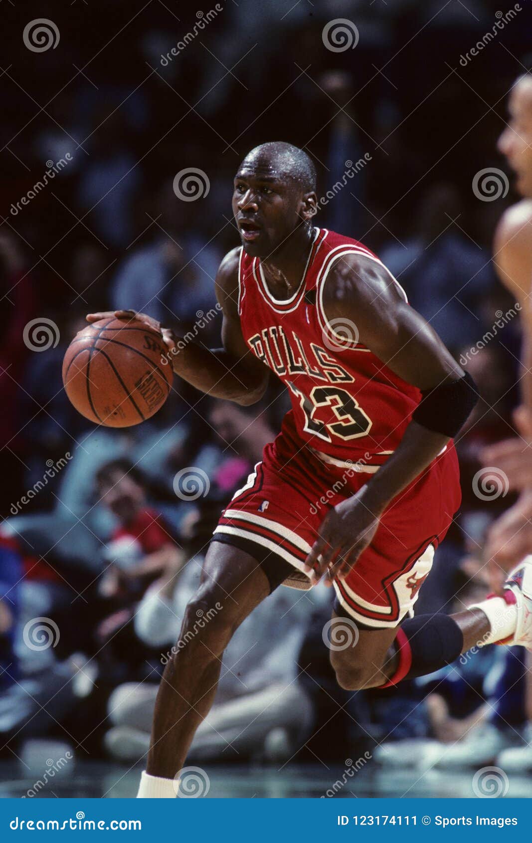 Michael Jordan of the Chicago Bulls dribbles up court during a NBA