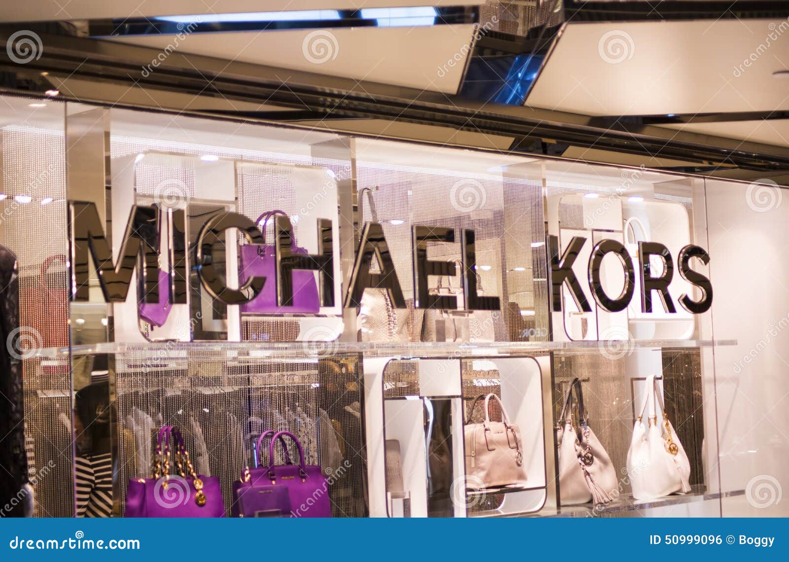voice Starting point person Michael Kors shop editorial photo. Image of clothes, sign - 50999096