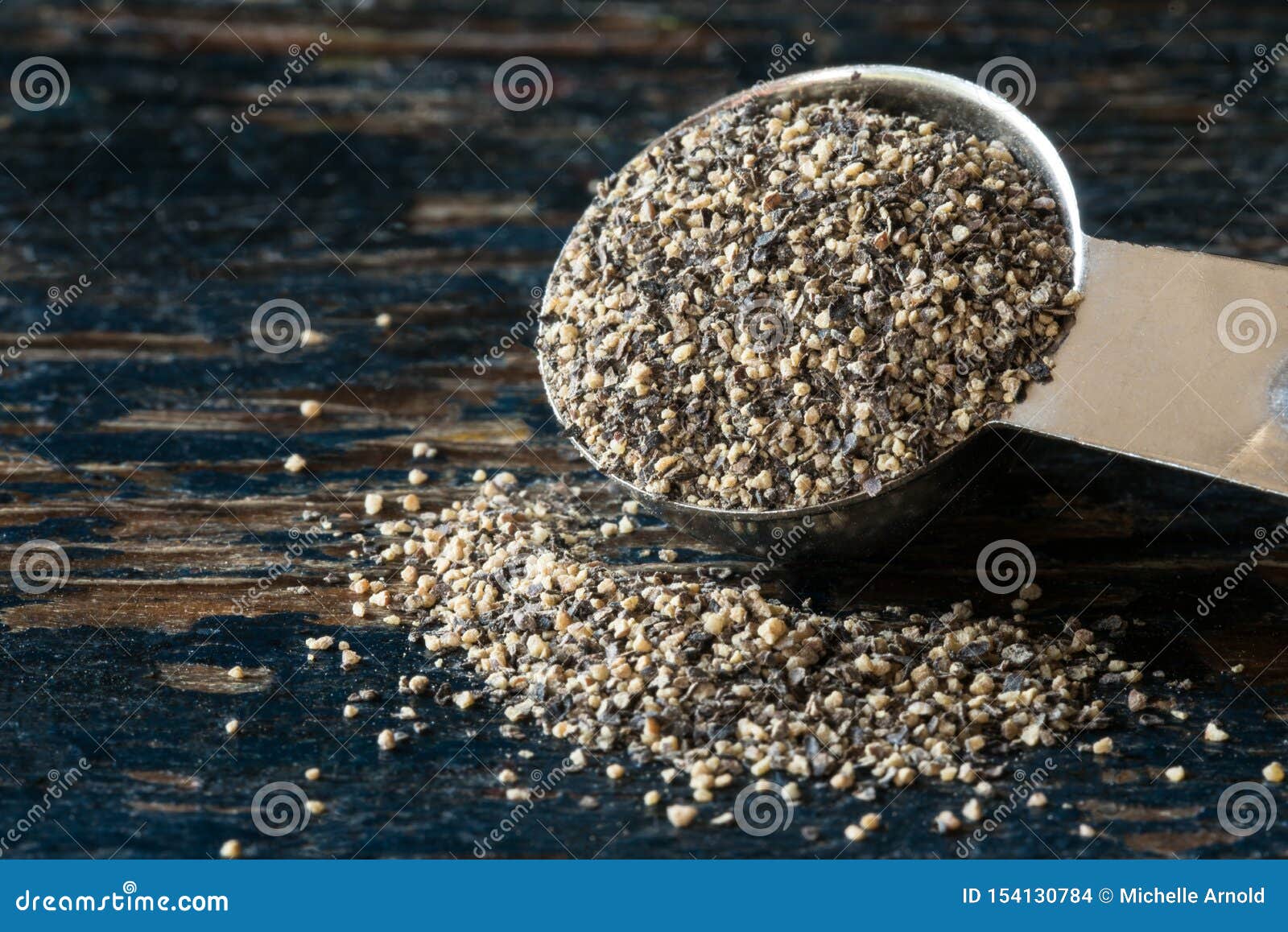 Ground Black Pepper Spilled from a Teaspoon Stock Photo Image of