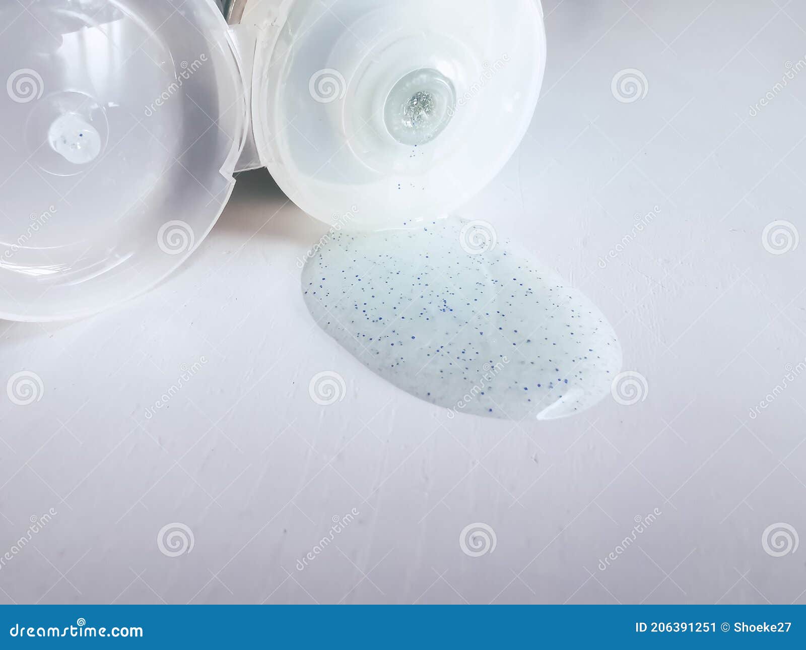 micro plastic particles in a face scrub on a white background