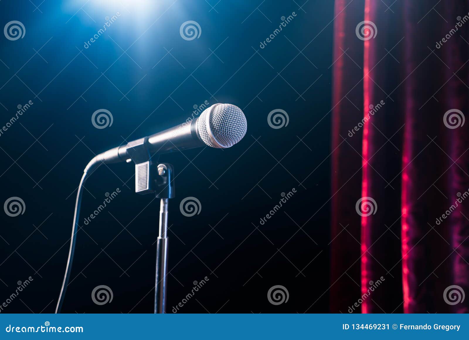 Microphone on a Stand Up Comedy Stage with Reflectors Ray, High