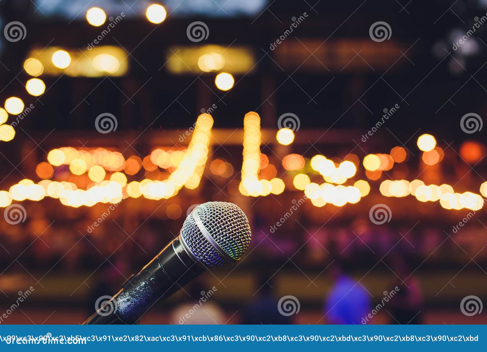 Microphone on a Stand Up Comedy Stage with Colorful Bokeh , High
