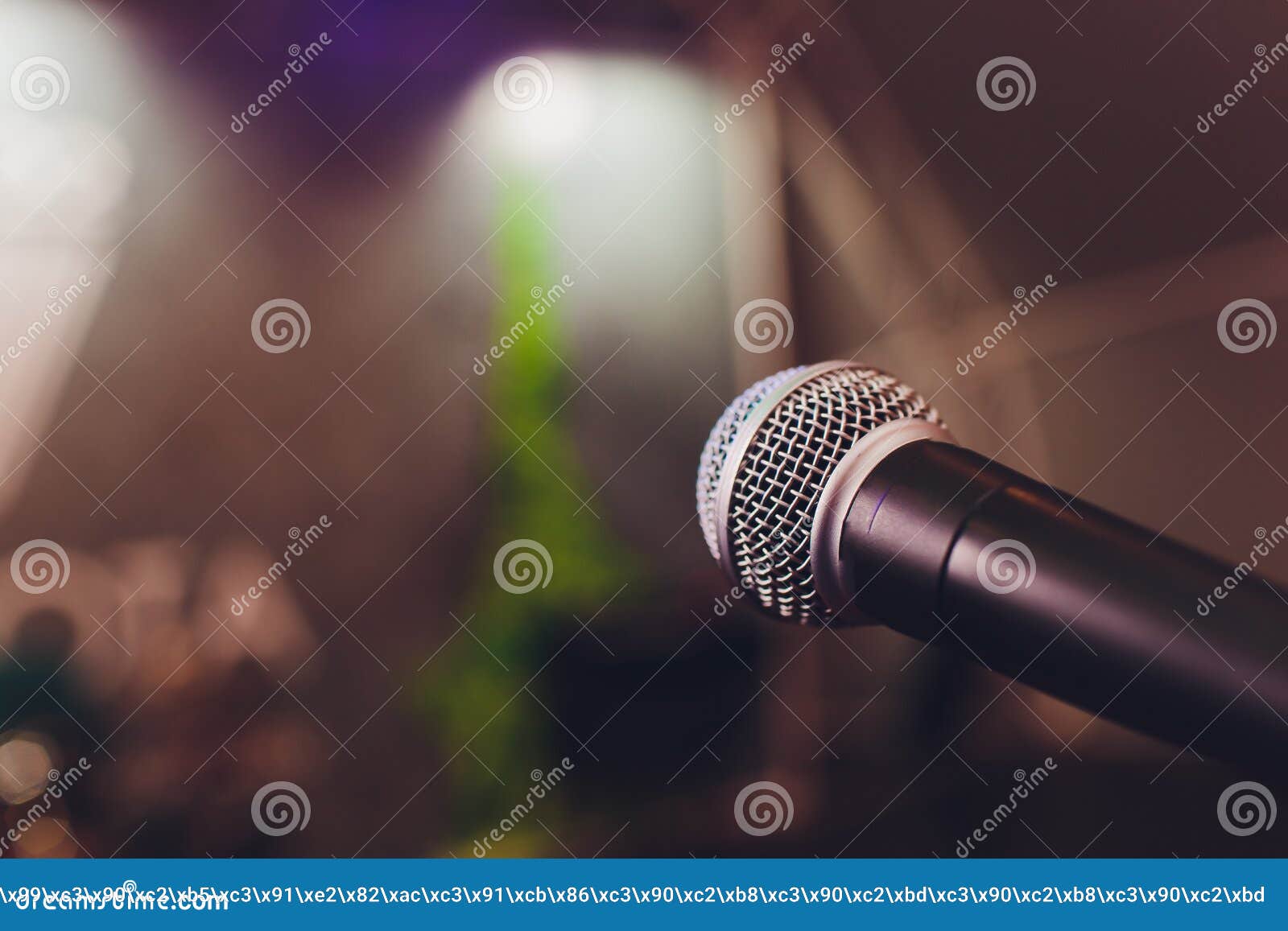 Microphone on a Stand Up Comedy Stage with Colorful Bokeh , High