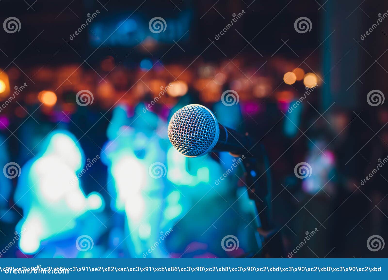 Microphone on a Stand Up Comedy Stage with Colorful Bokeh , High