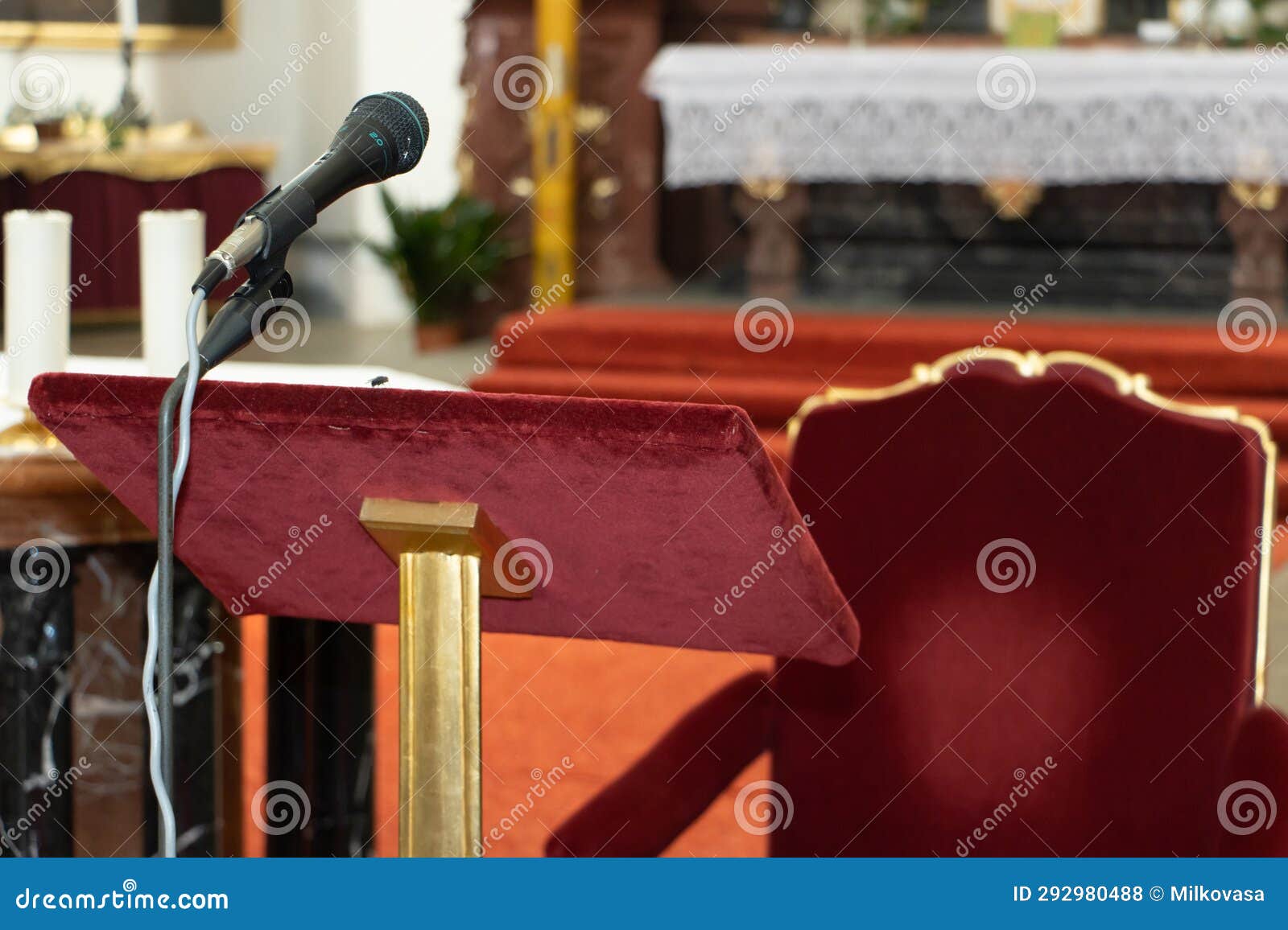 A Microphone with a Table for a Speaker in a Baroque Church Stock Photo