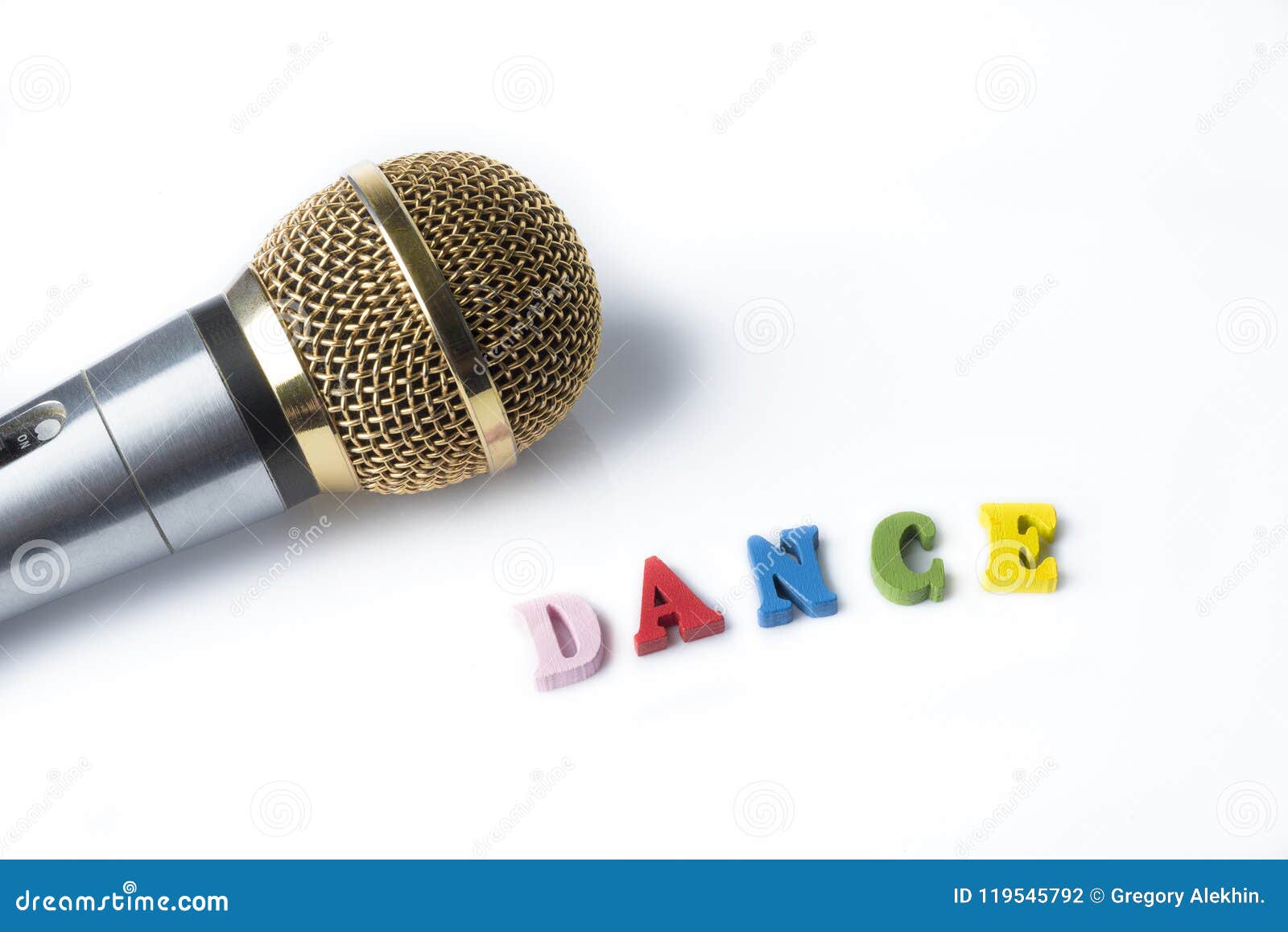 Microphone on a White Background with the Word Dance. Stock Photo