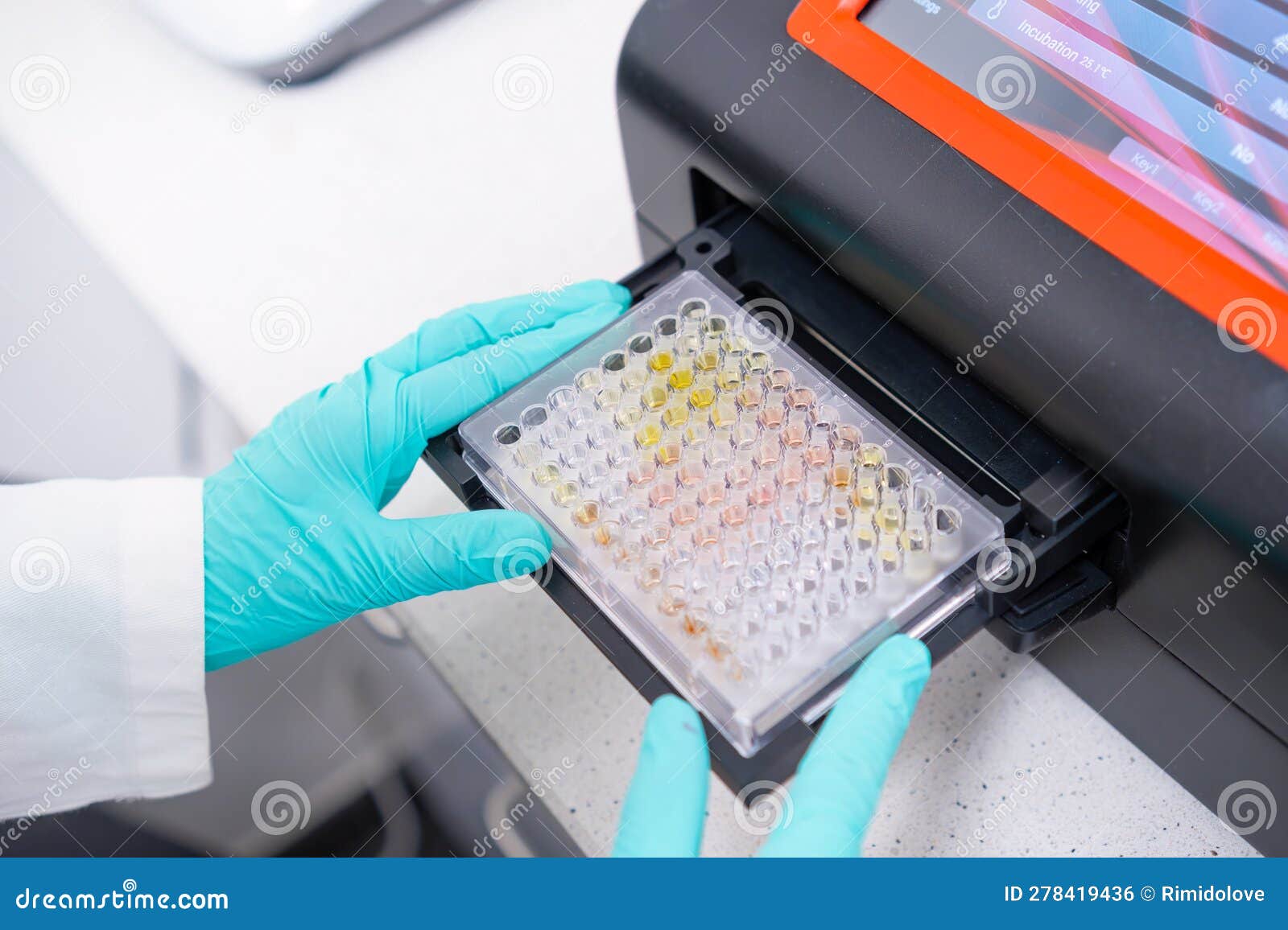 a microplate spectrophotometer is used by scientist to analyze dna samples by inserting microplate.