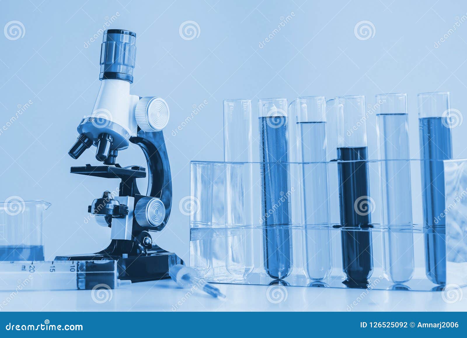 Microscope and Laboratory Glassware or Test Tube Stock Photo - Image of ...