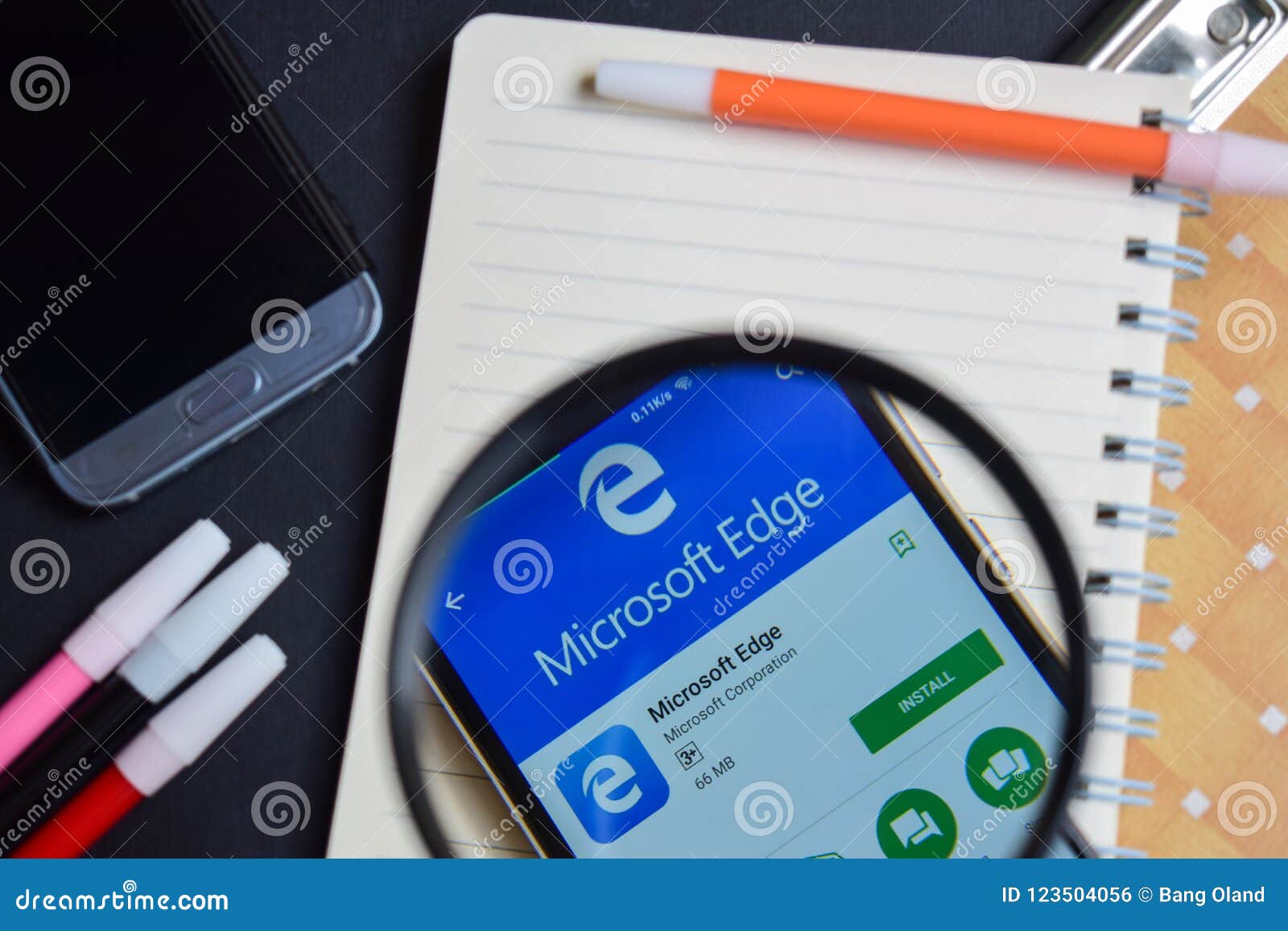 Microsoft Edge App with Magnifying on Smartphone Screen. Editorial