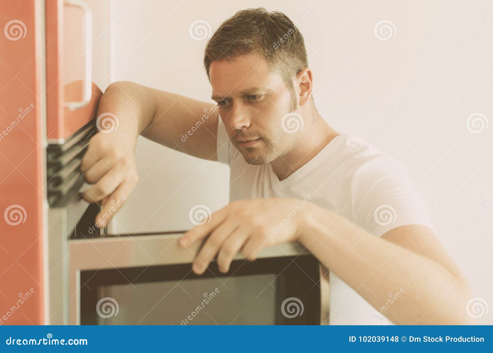 Microwave oven repairing. stock photo. Image of expertise 102039148