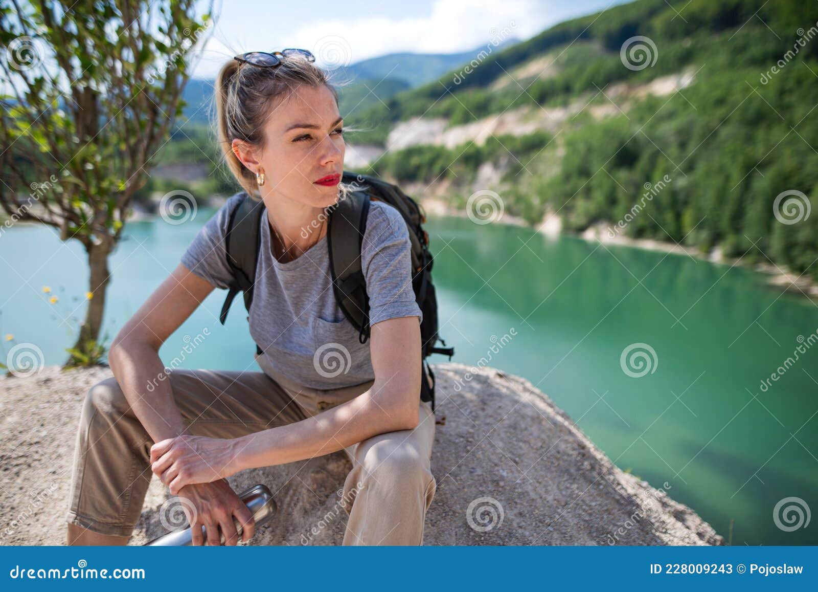 Mid Adult Woman Tourist on Hiking Trip on Summer Holiday, Resting by ...