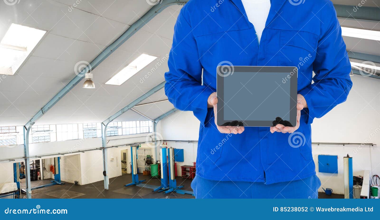 Mid Section of Mechanic Holding Digital Tablet Stock Photo Image of