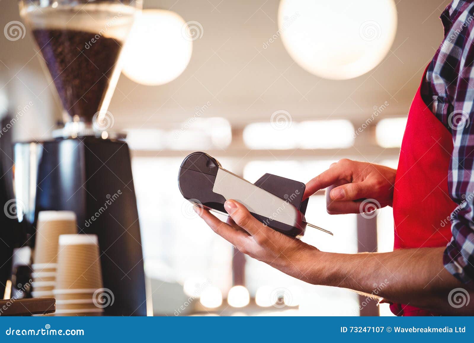Mid Section of Waiter Using Credit Card Machine Stock Image Image of